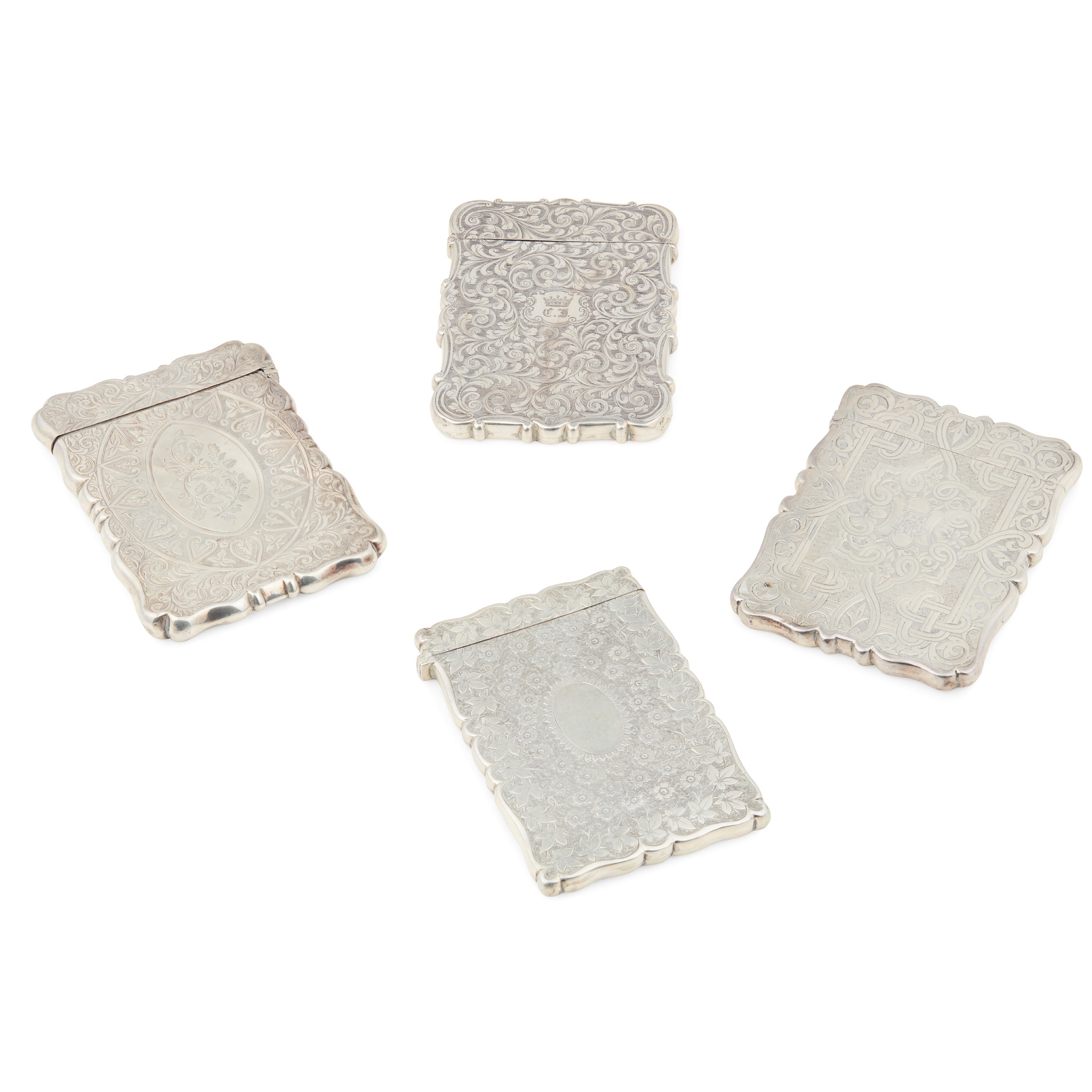 A collection of four Victorian card cases