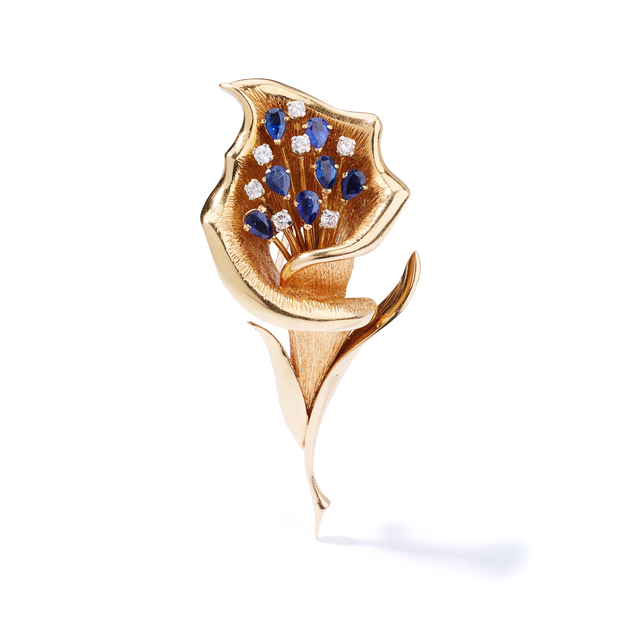 A sapphire and diamond brooch, circa 1961