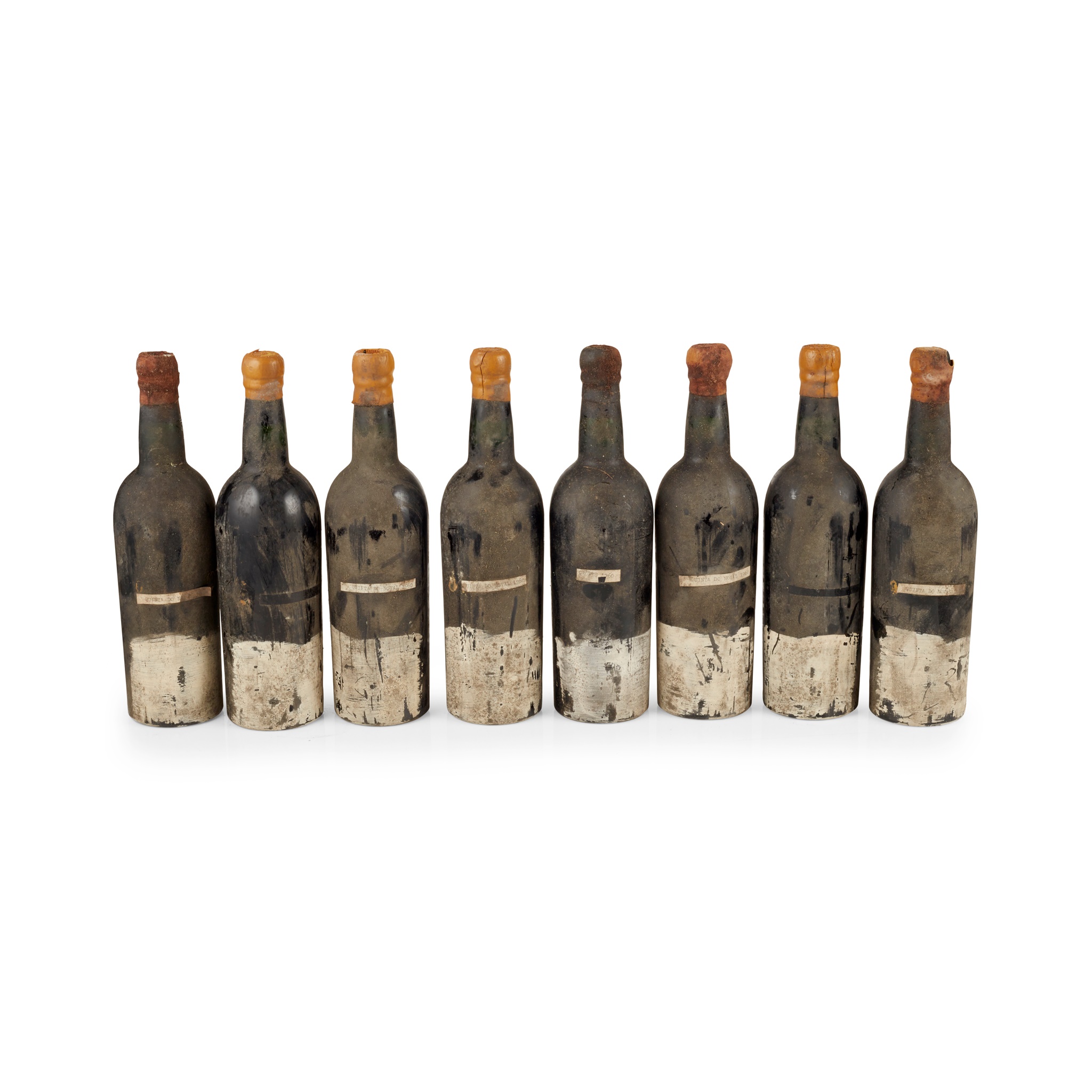 A group of eight bottles of Port