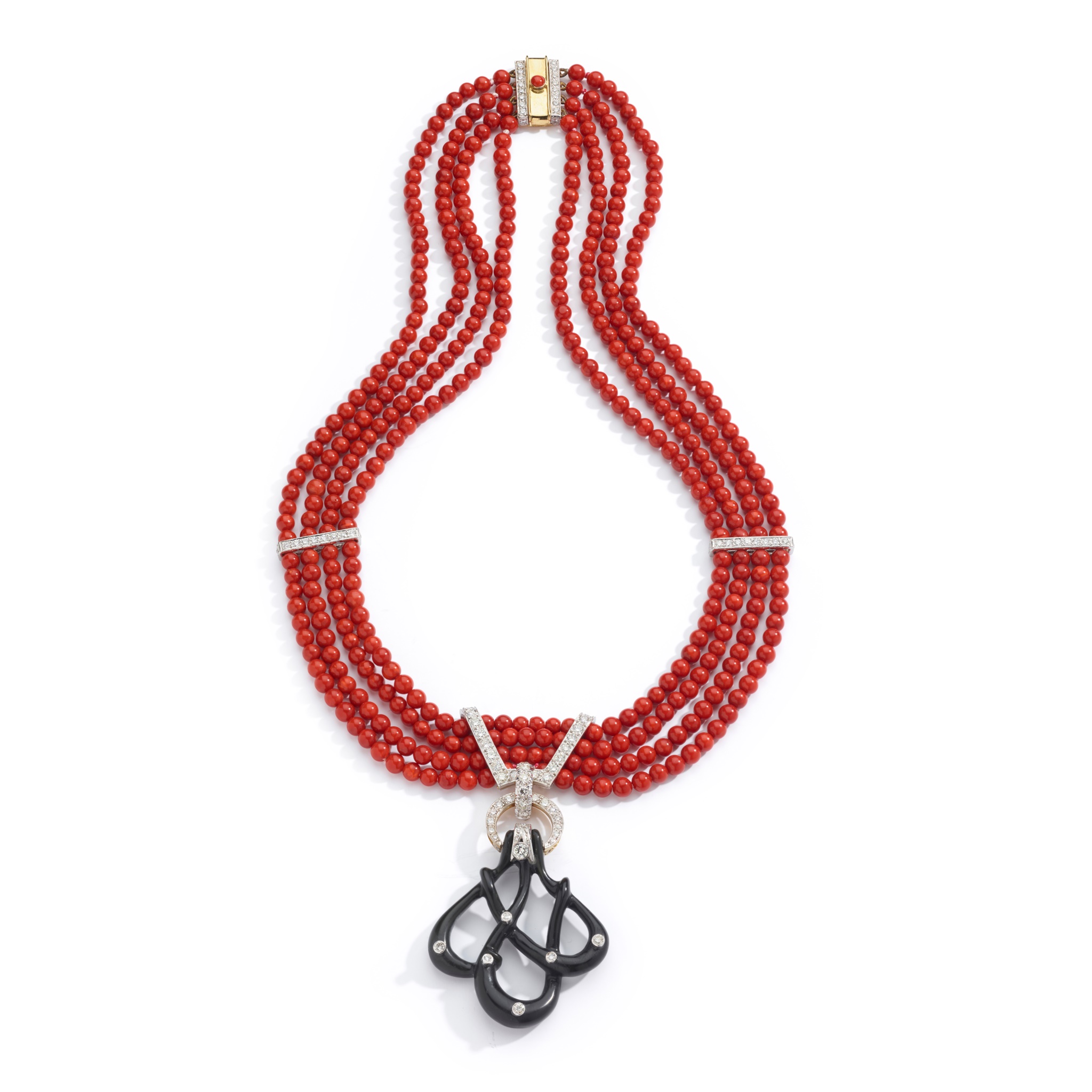A coral, onyx and diamond necklace