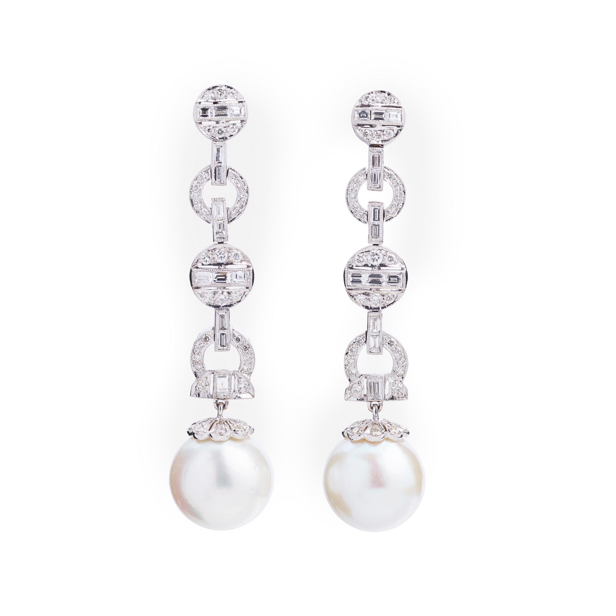 A pair of cultured pearl and diamond earrings