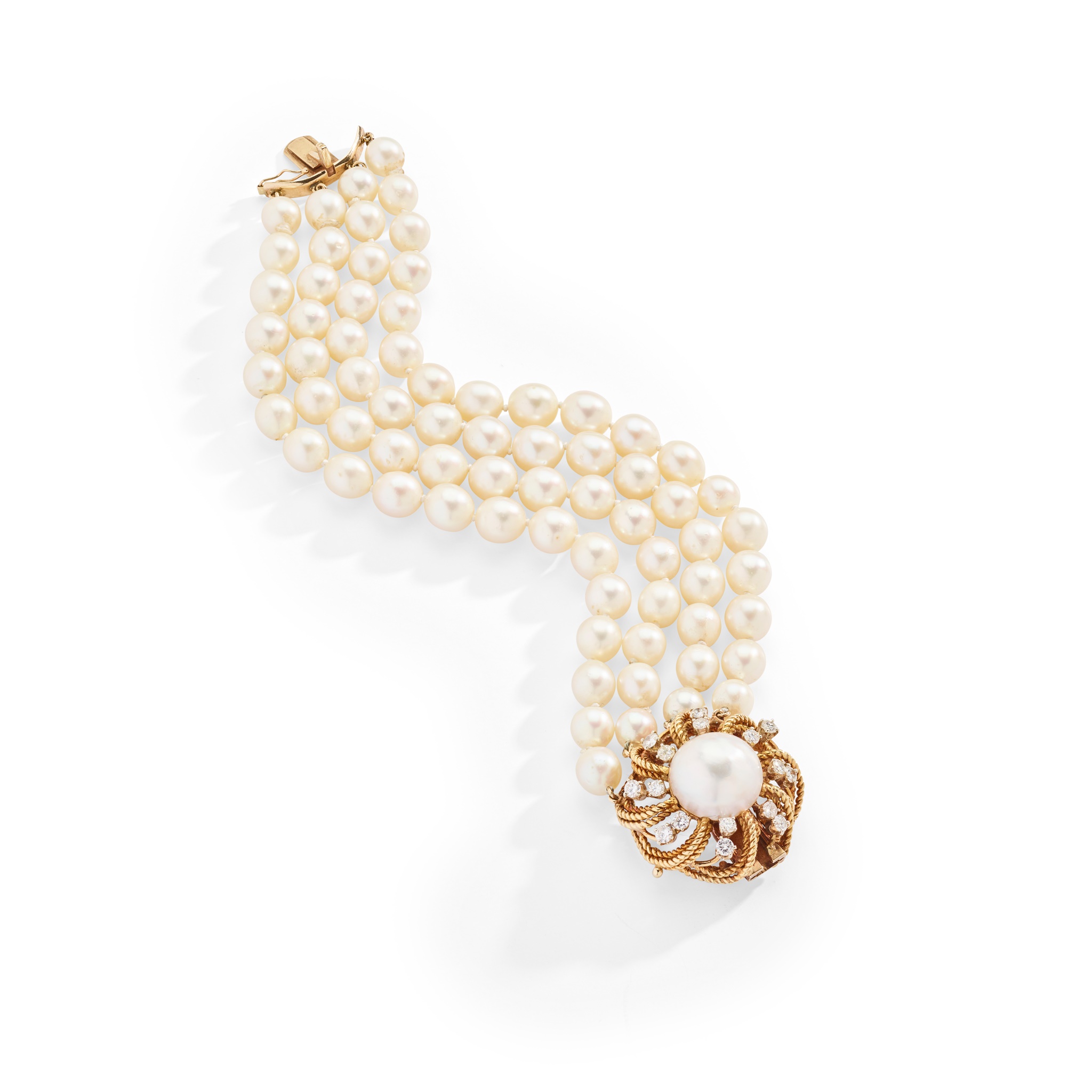 A cultured pearl and diamond bracelet, by Seaman Schepps