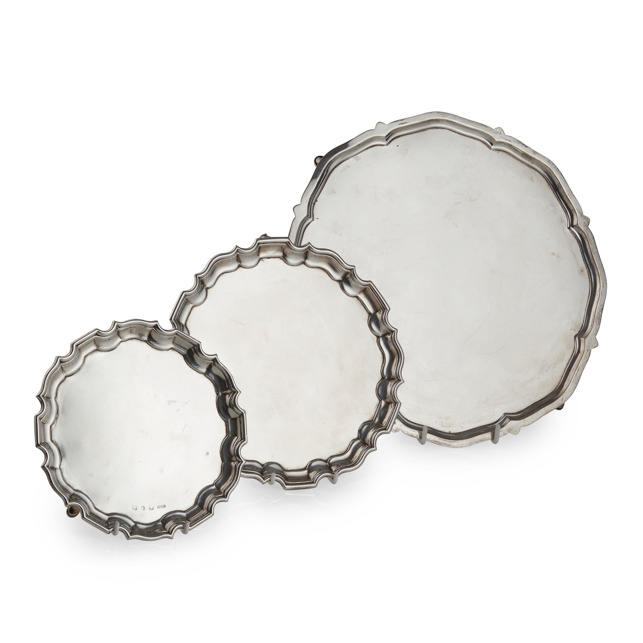 A group of three salvers and trays