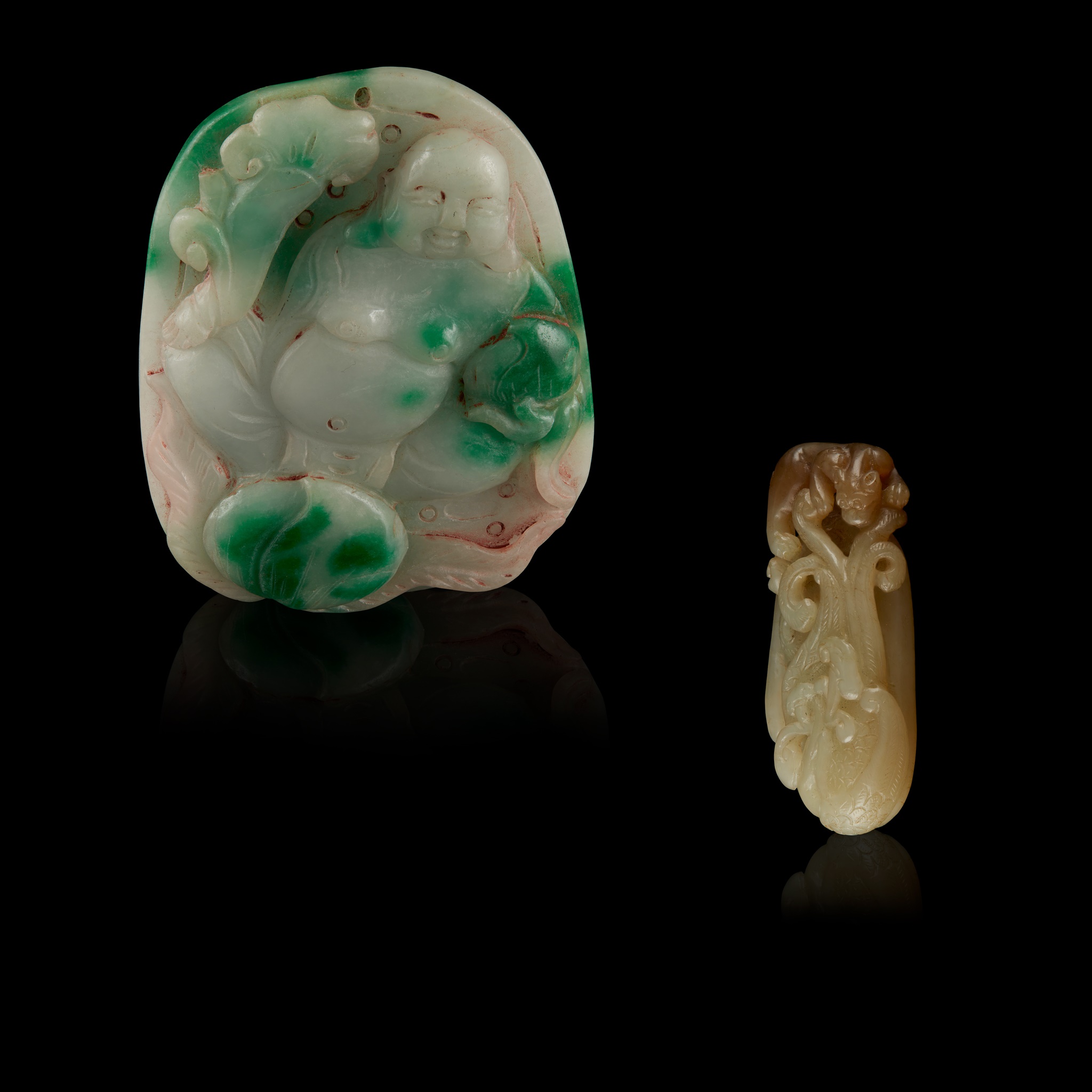 TWO JADE PENDANTS