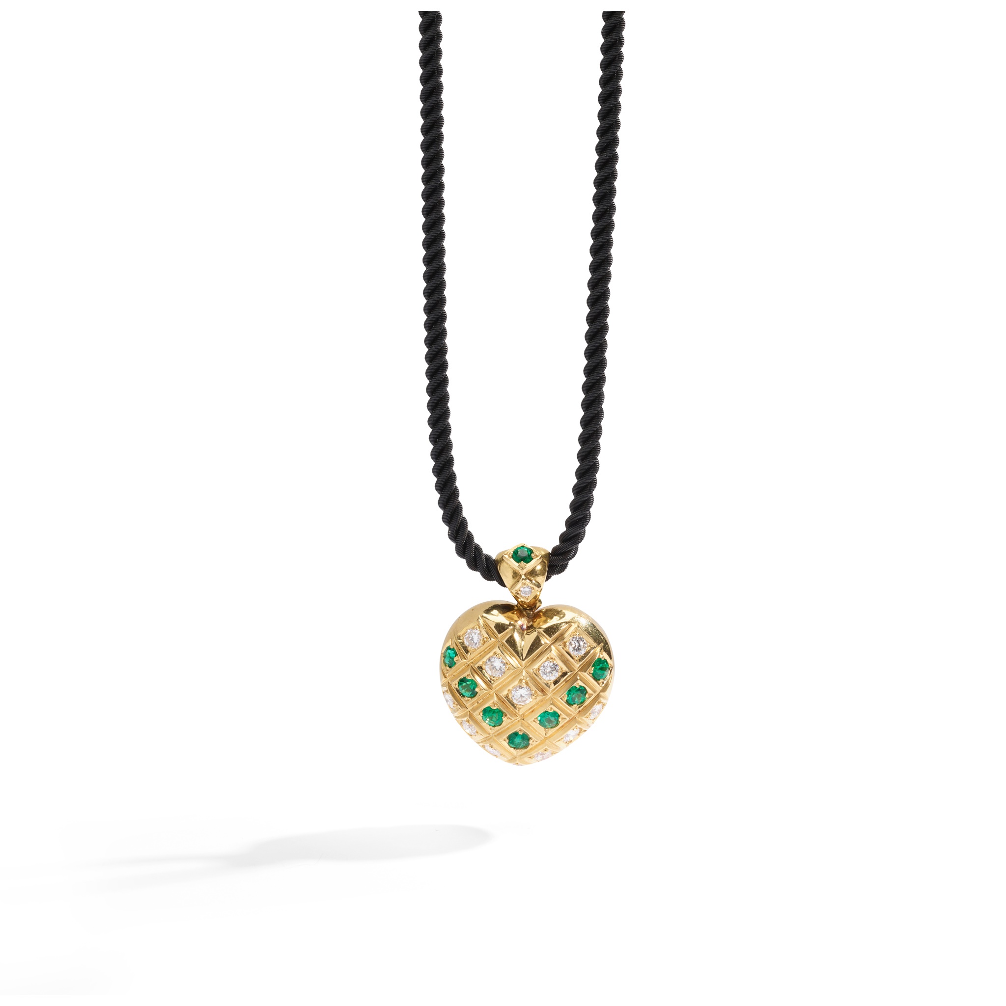 An emerald and diamond pendant necklace