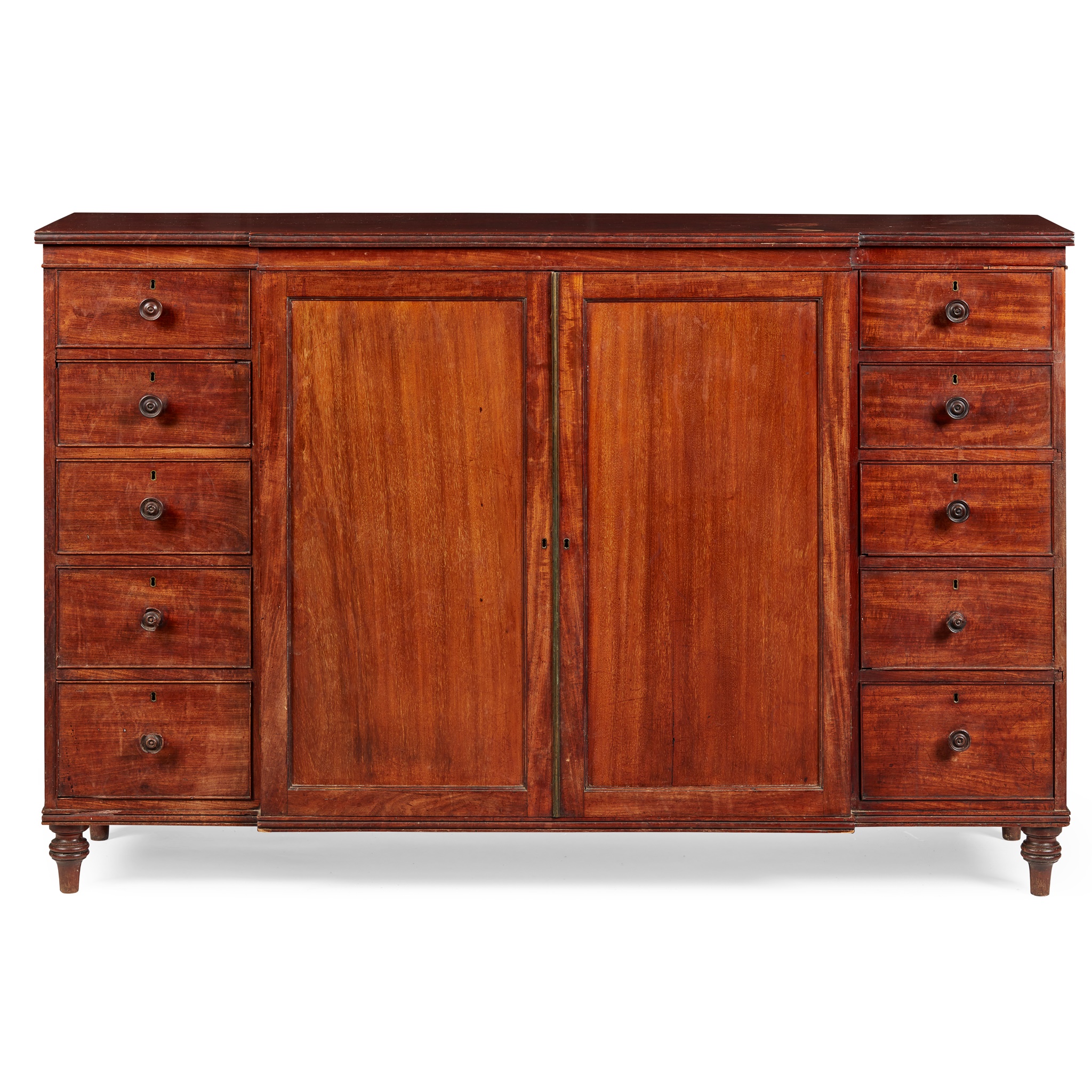 REGENCY MAHOGANY LOW BREAKFRONT PRESS CUPBOARD, IN THE MANNER OF GILLOWS