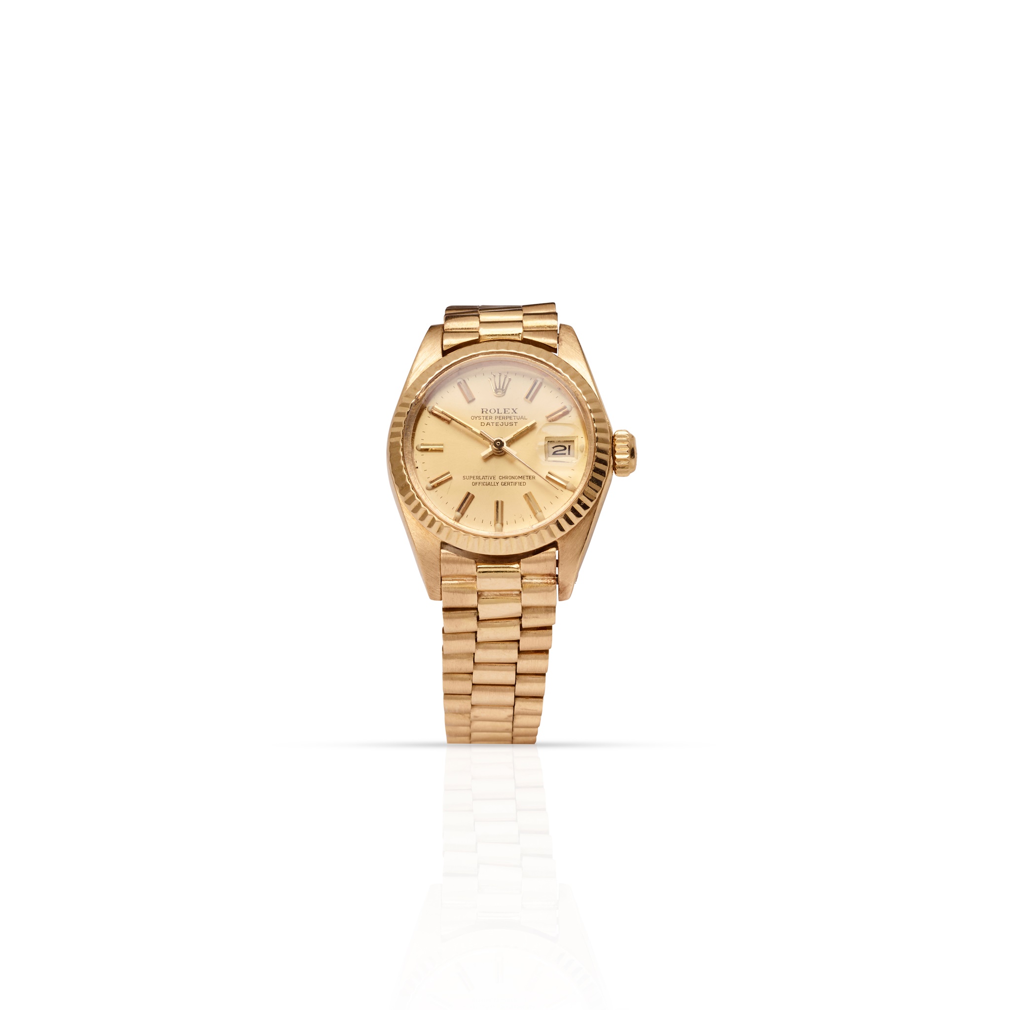 Rolex: a gold wristwatch