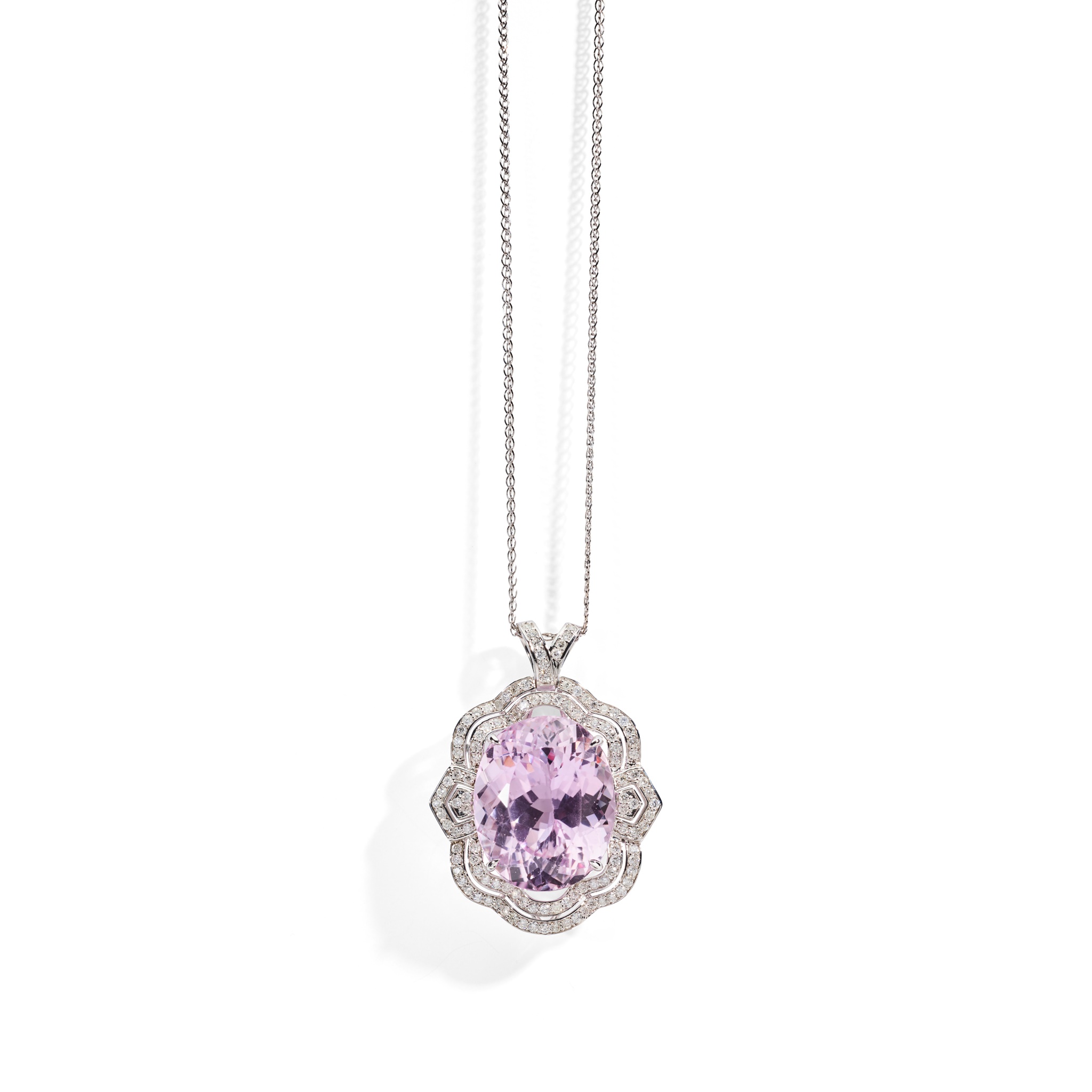 A kunzite and diamond pendant