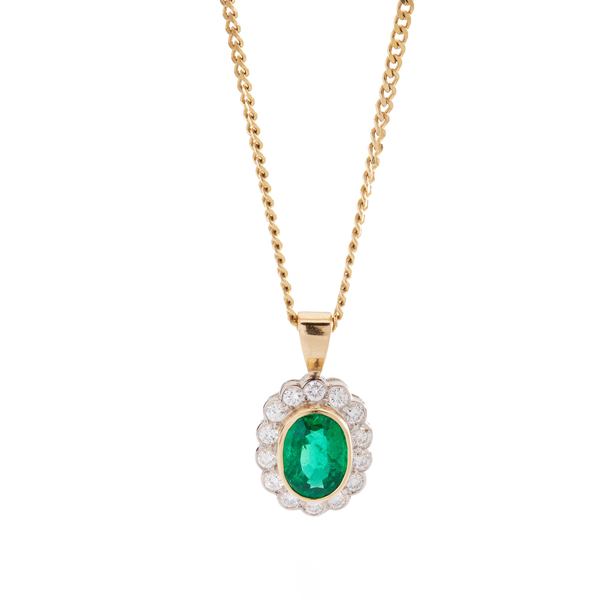 An emerald and diamond pendant