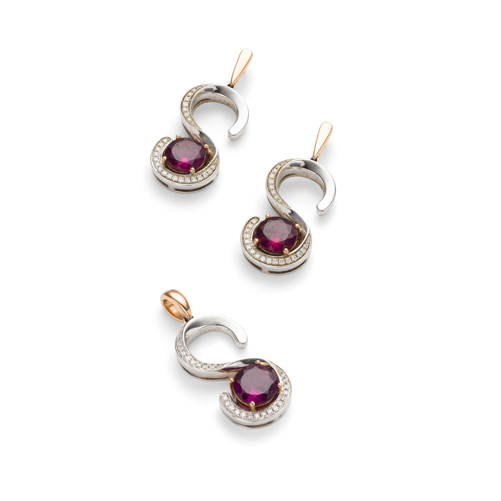 A pair of rhodolite garnet and diamond earrings and a matching pendant