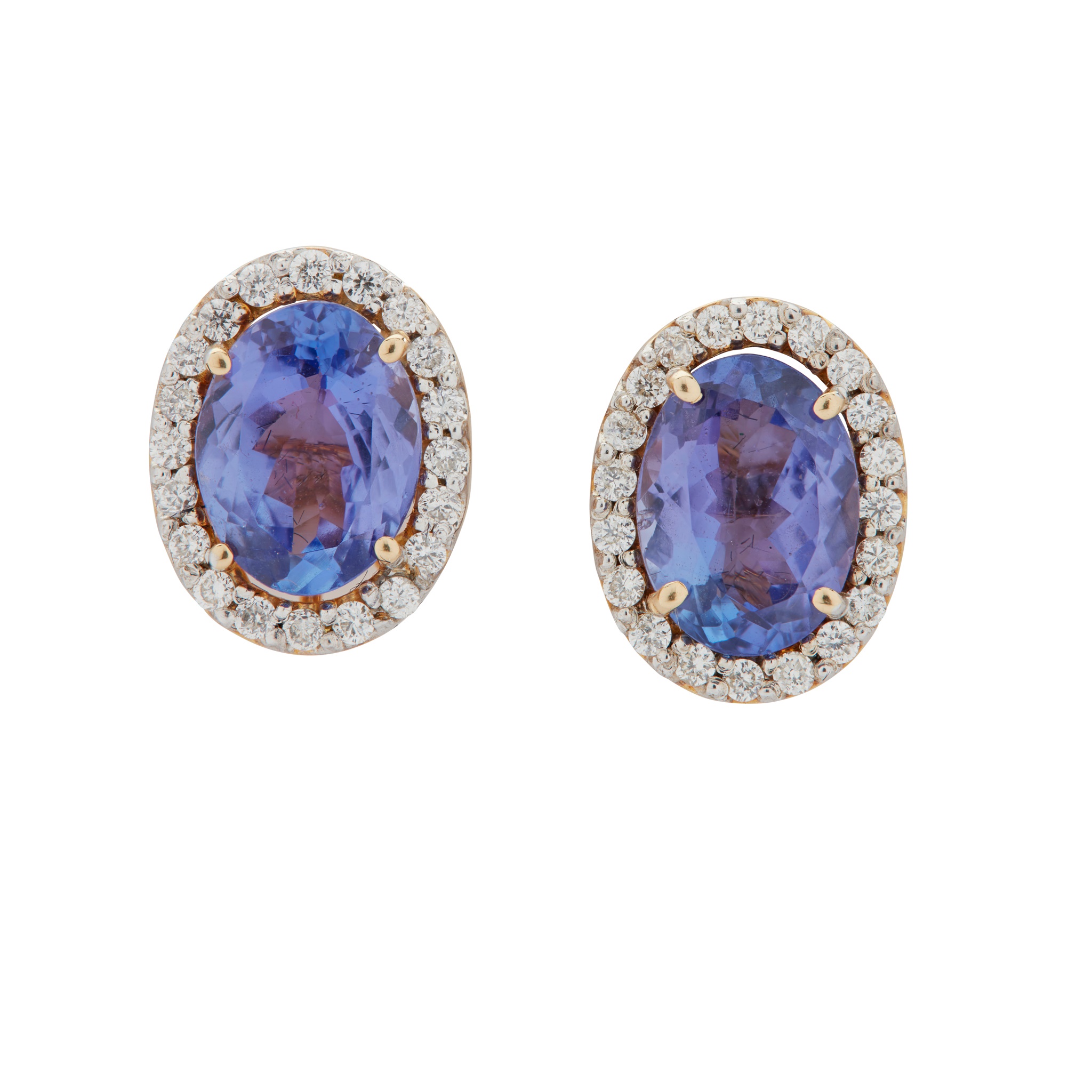 A pair of Tanzanite and diamond cluster earrings