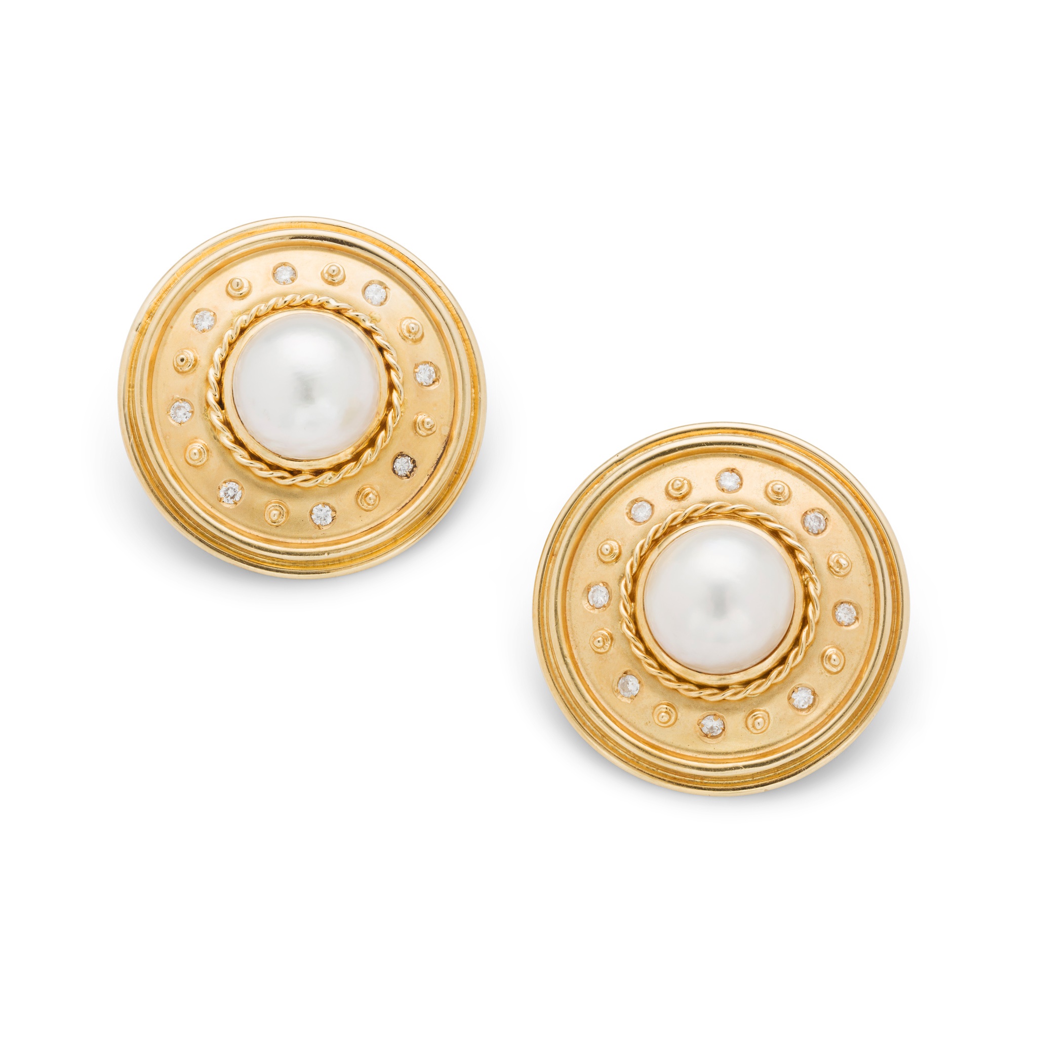 A pair of pearl and diamond earrings