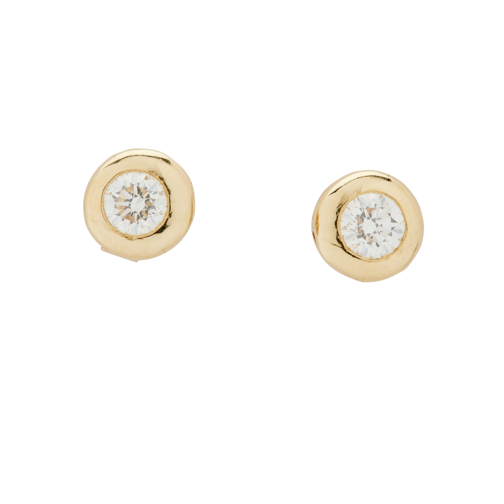 A pair of diamond stud earrings