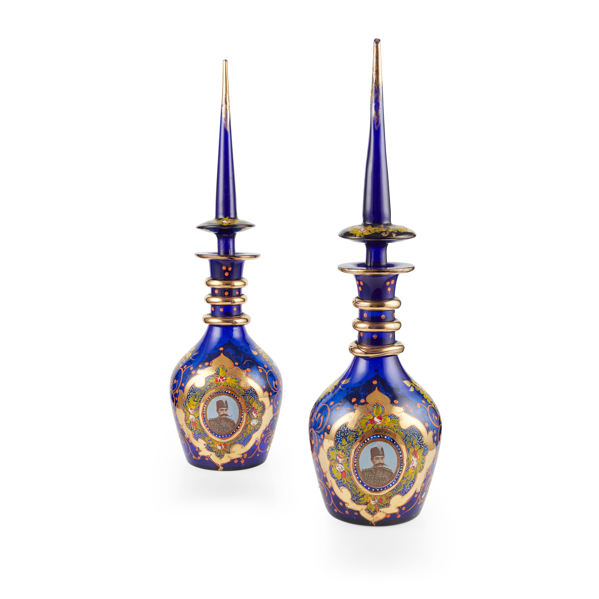 Bohemian polychrome and gilt-painted cut glass decanters