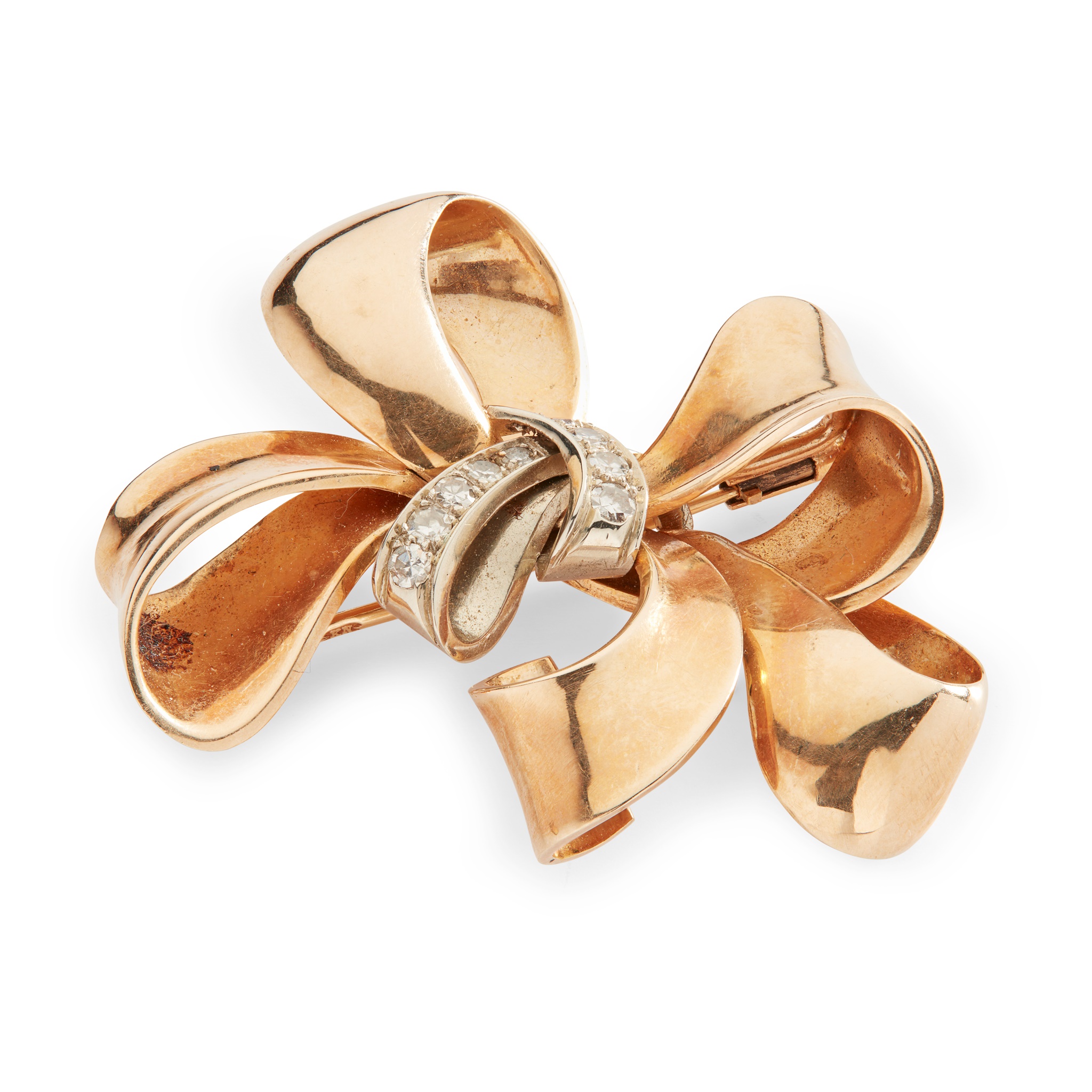A diamond bow brooch