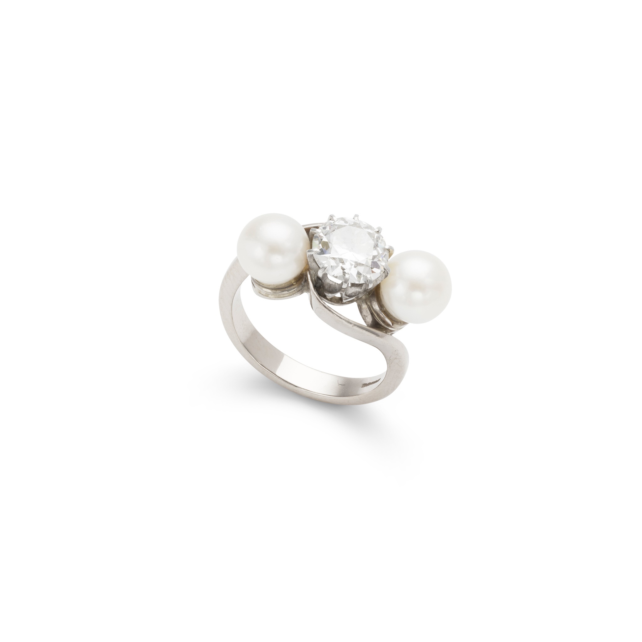 A cultured pearl and diamond three-stone ring