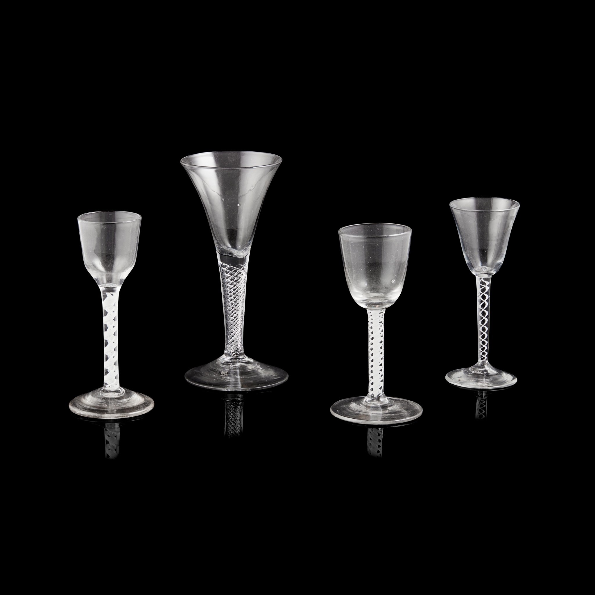 THREE OPAQUE TWIST WINE GLASSES