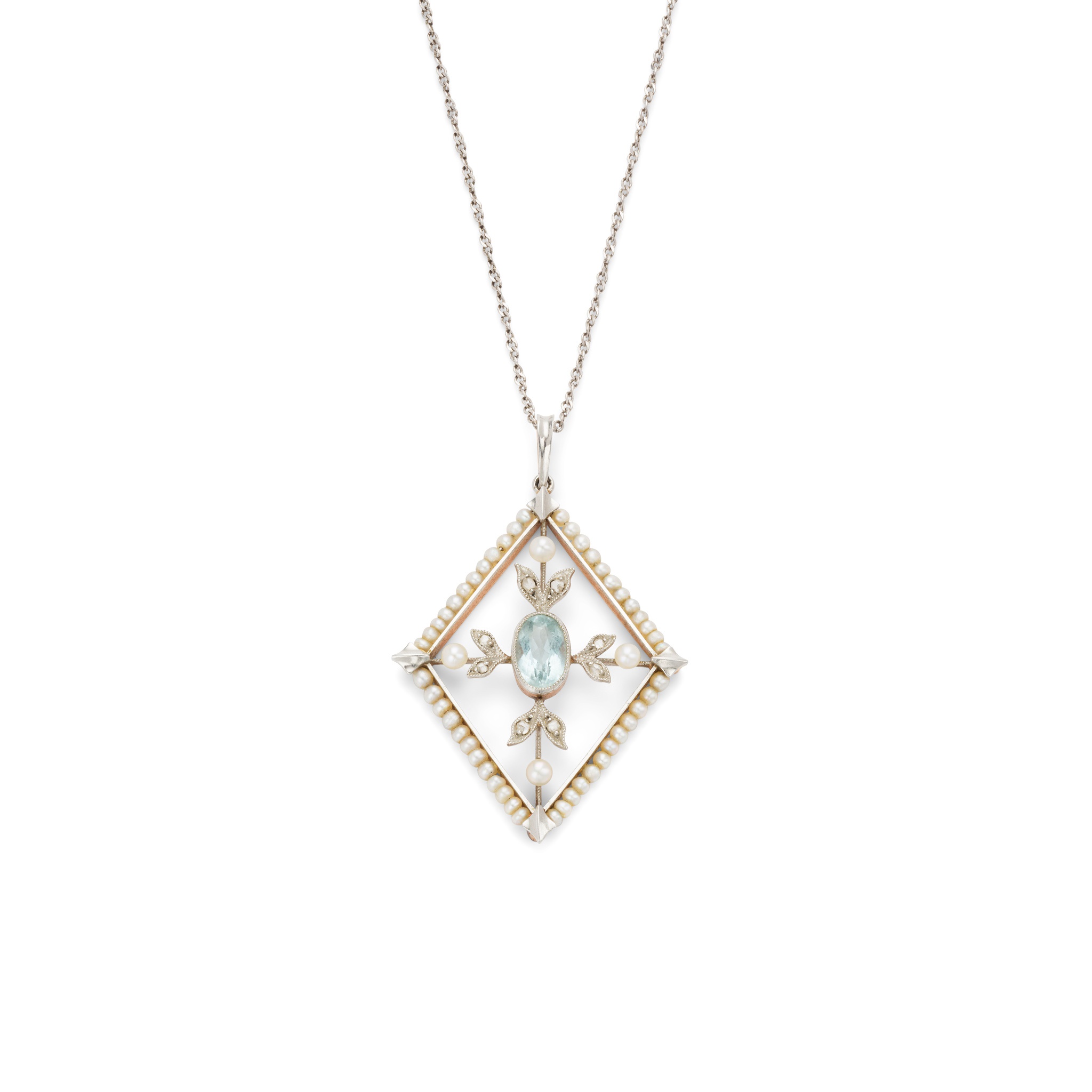 An Edwardian aquamarine and seed pearl pendant
