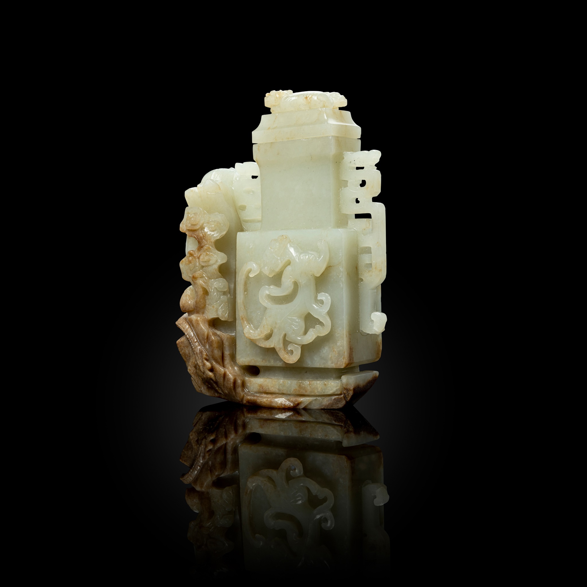 WHITE JADE WITH RUSSET SKIN 'DRAGON' LIDDED VASE