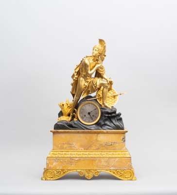 <p>An impressive French Restoration-style pendulum clock, crowned with a detailed figure of Achilles. The case is crafted from a combination of partly fire-gilt and darkly patinated bronze, set upon a plinth of high-quality yellow marble. The high-quality