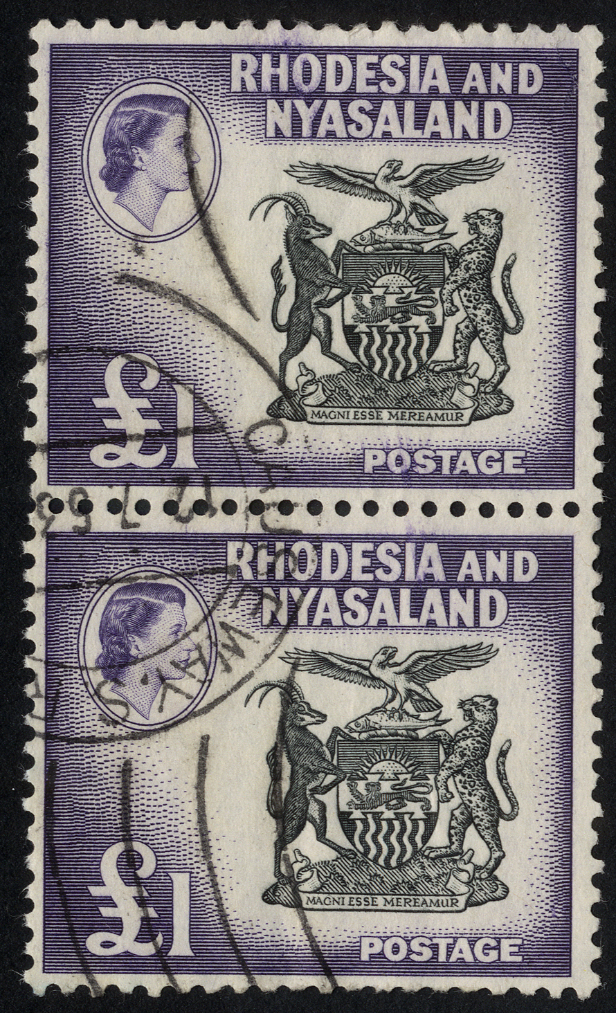 1959 £1 black and violet vertical pair, used with quite neat CAUSEWAY CDS of 12.7.63, lower perfs just nibbled. SG 31, cat...