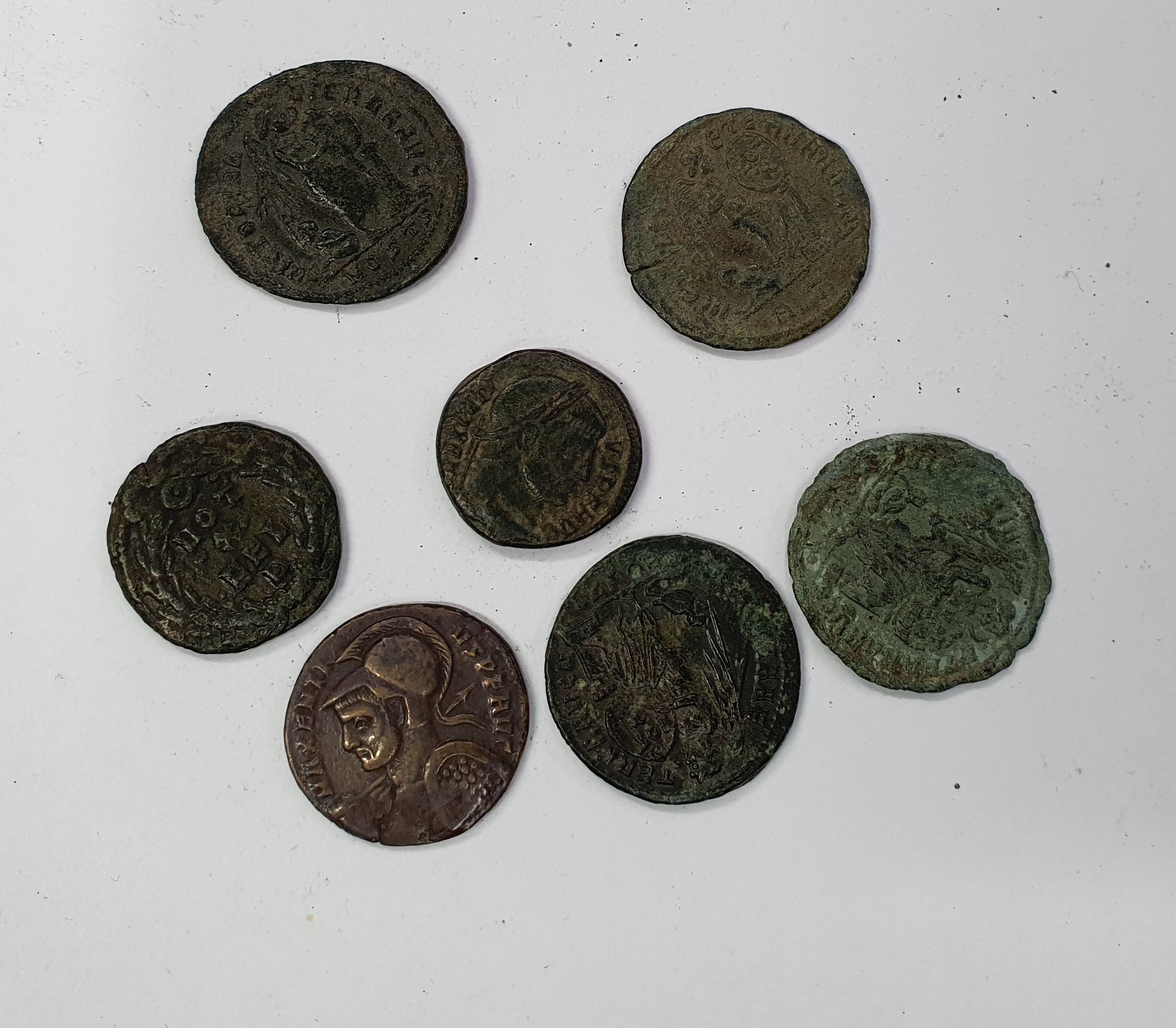 Group of 7 Maxentius AE Folles. Various mints.