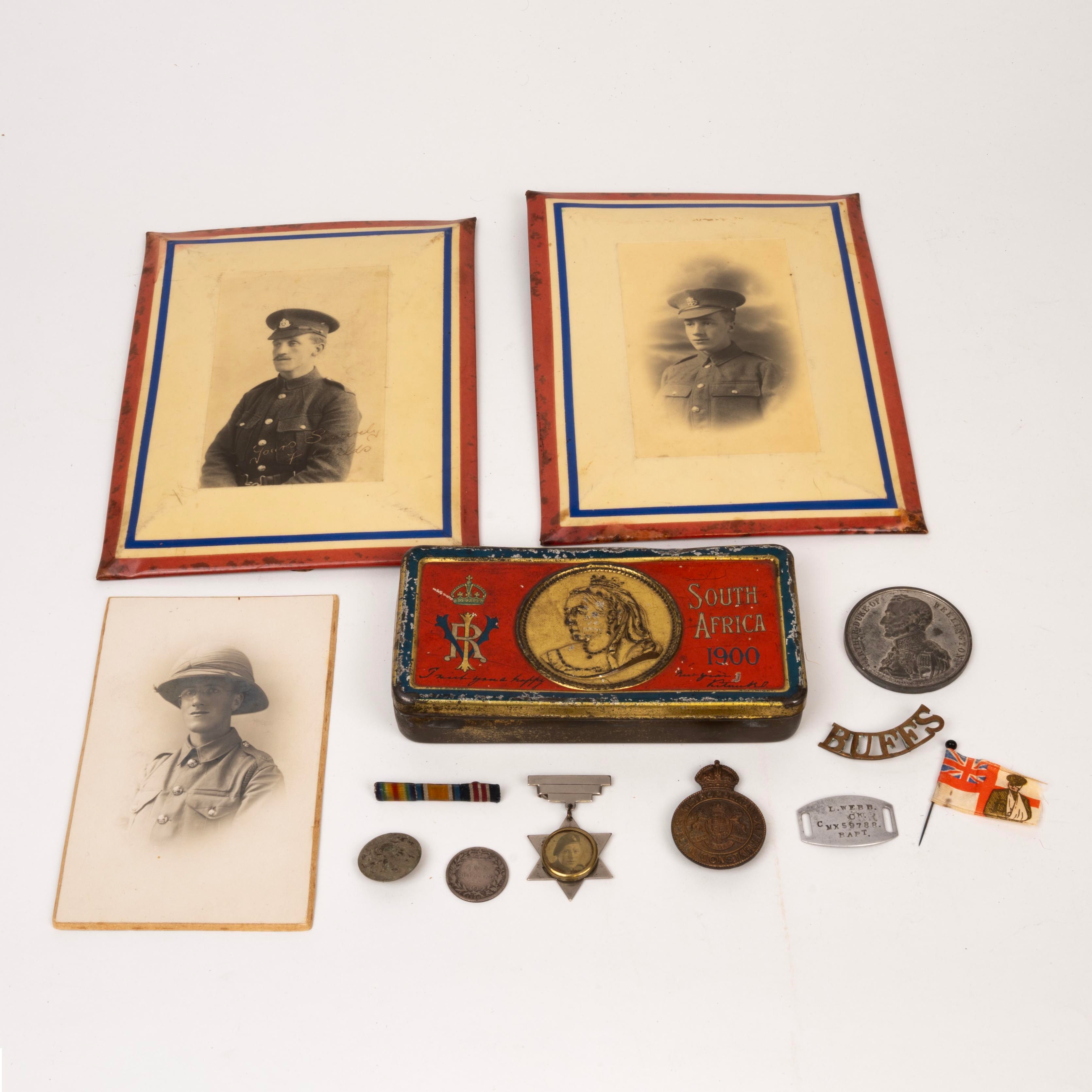 Assorted Boer War and Great War items, including: 1900 QV Christmas tin with Boer War commemorative silk