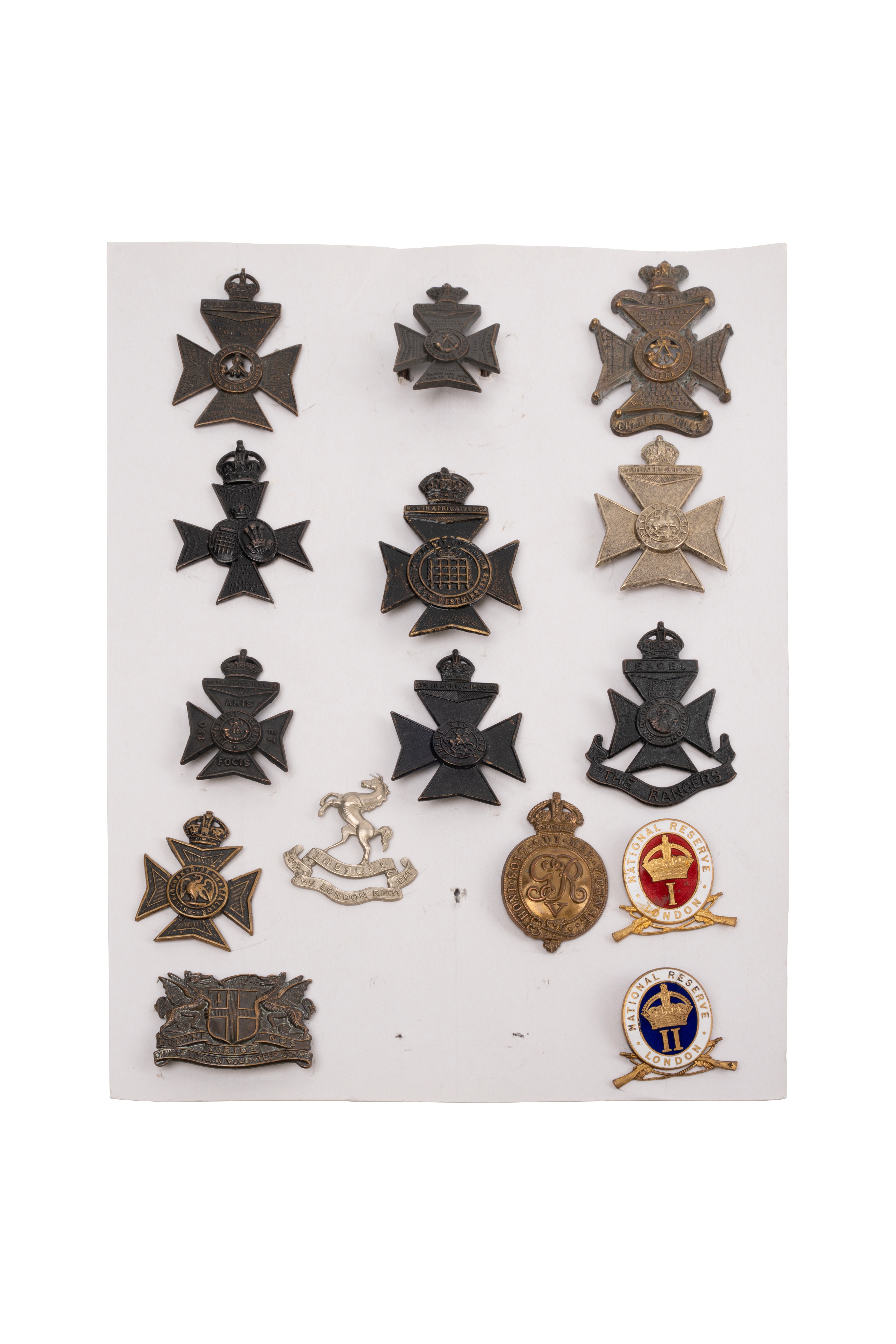 15 British cap badges, Mounted on sheet