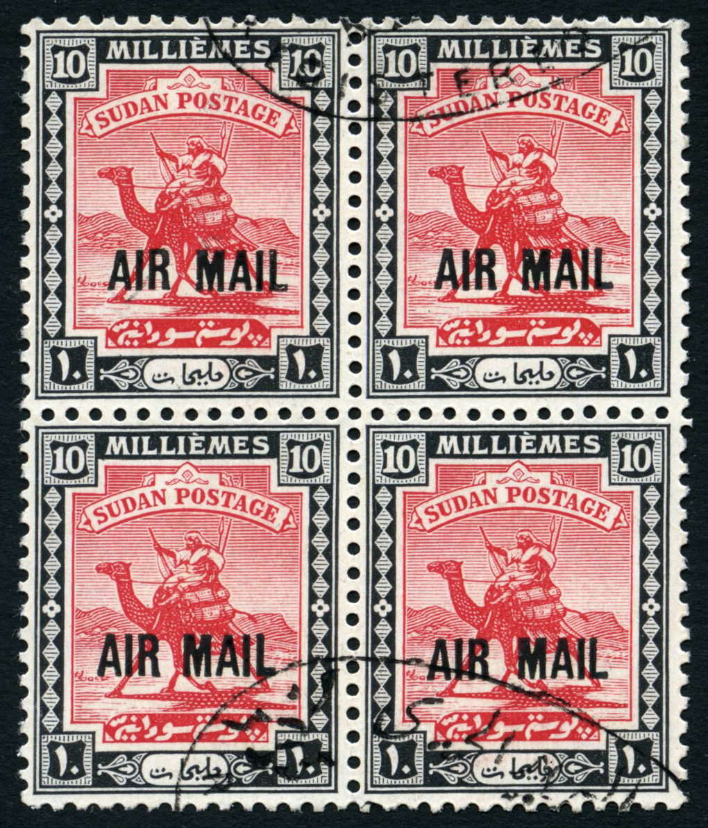 1931 AIR MAIL on 10m carmine and black used block of four with two part Registered oval cancels. SG 48, cat...