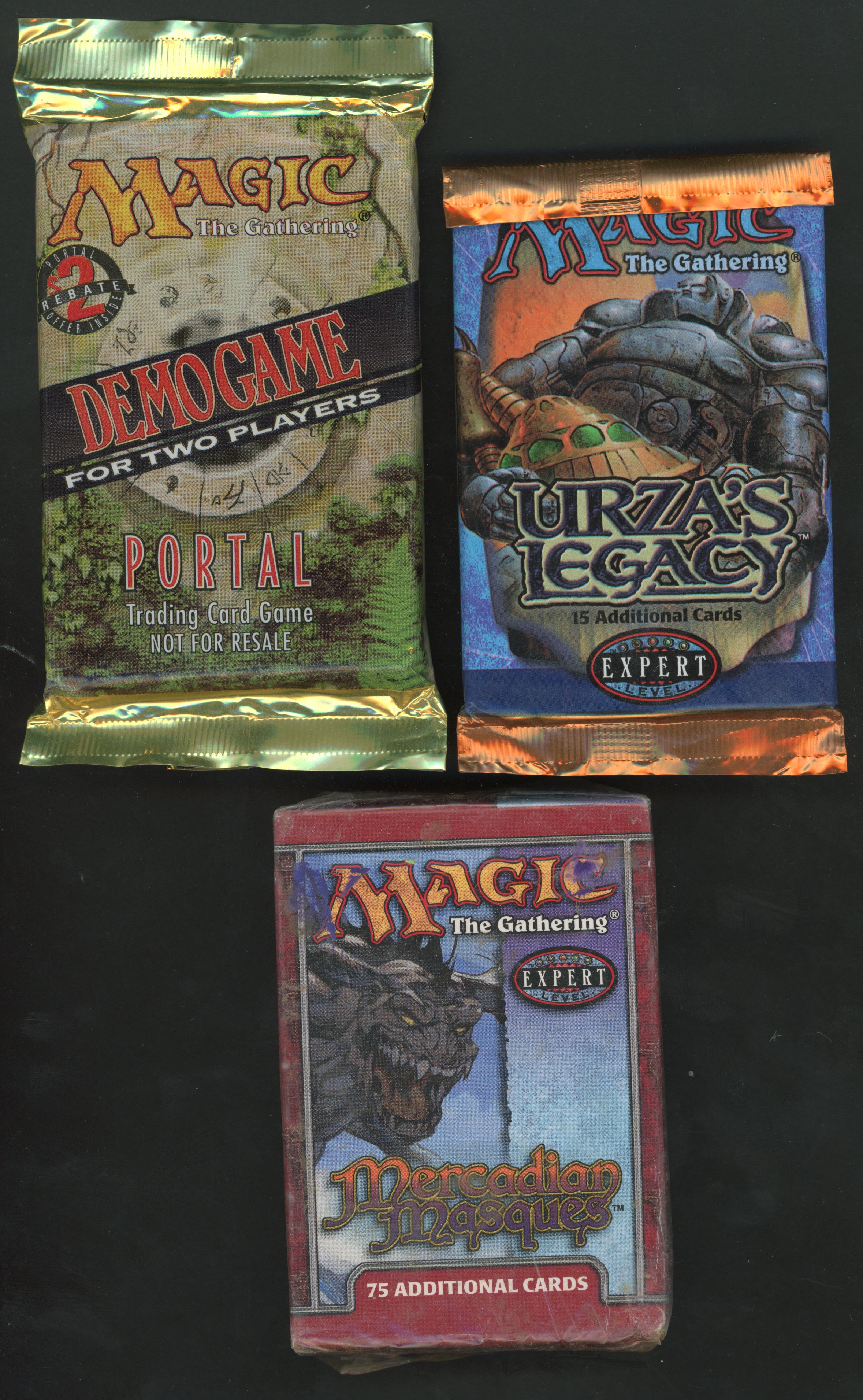 Magic The Gathering - Sealed Mercadian Masques Tournament Pack, Sealed Urza's Legacy Booster pack and Portal two player pack.