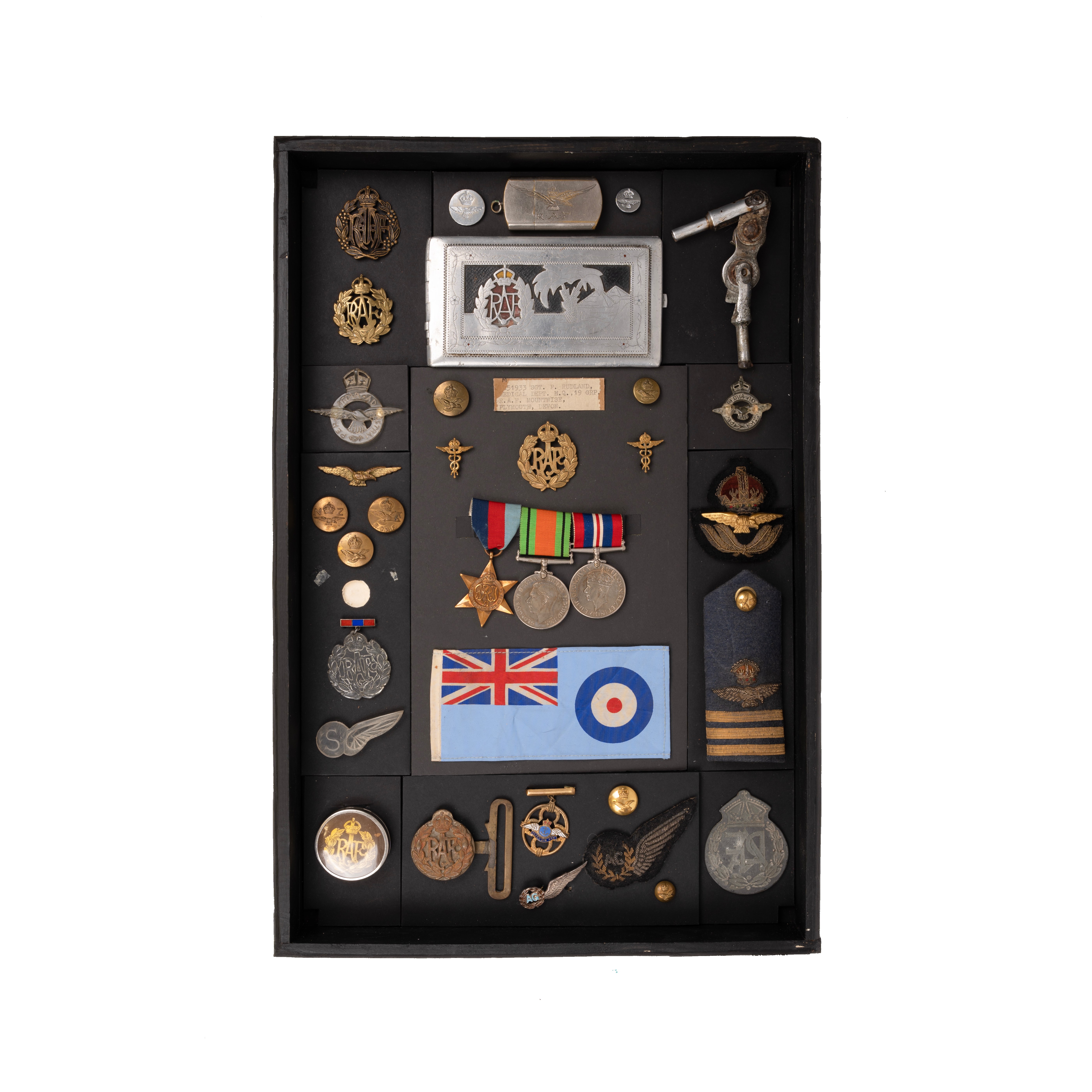 RAF display of badges and medals housed in display box 