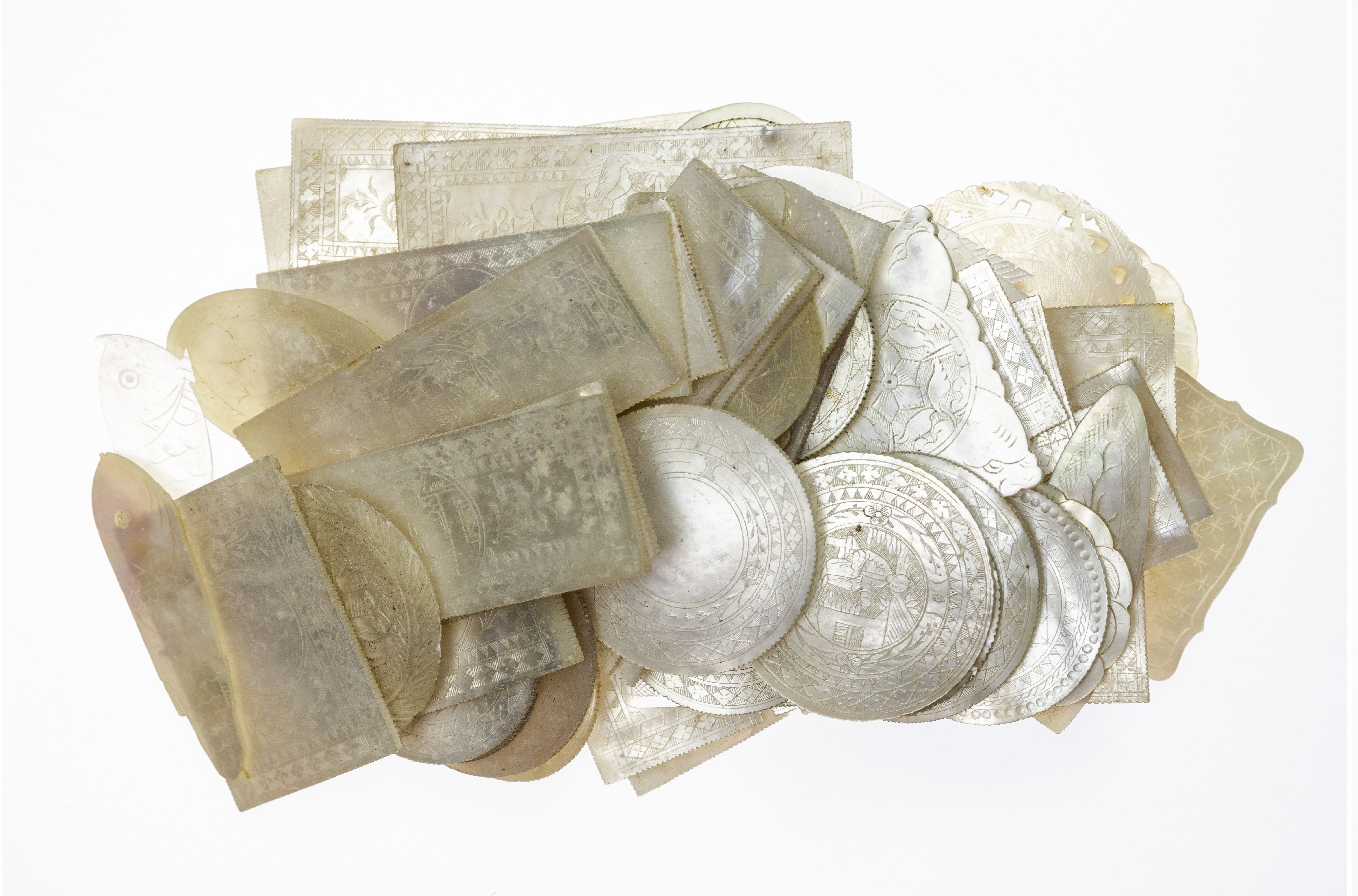 China. Victorian Mother of Pearl Gambling Tokens. Circa 1845-1880. X63 Pieces. Various designs, all Uncirculated. Rare.