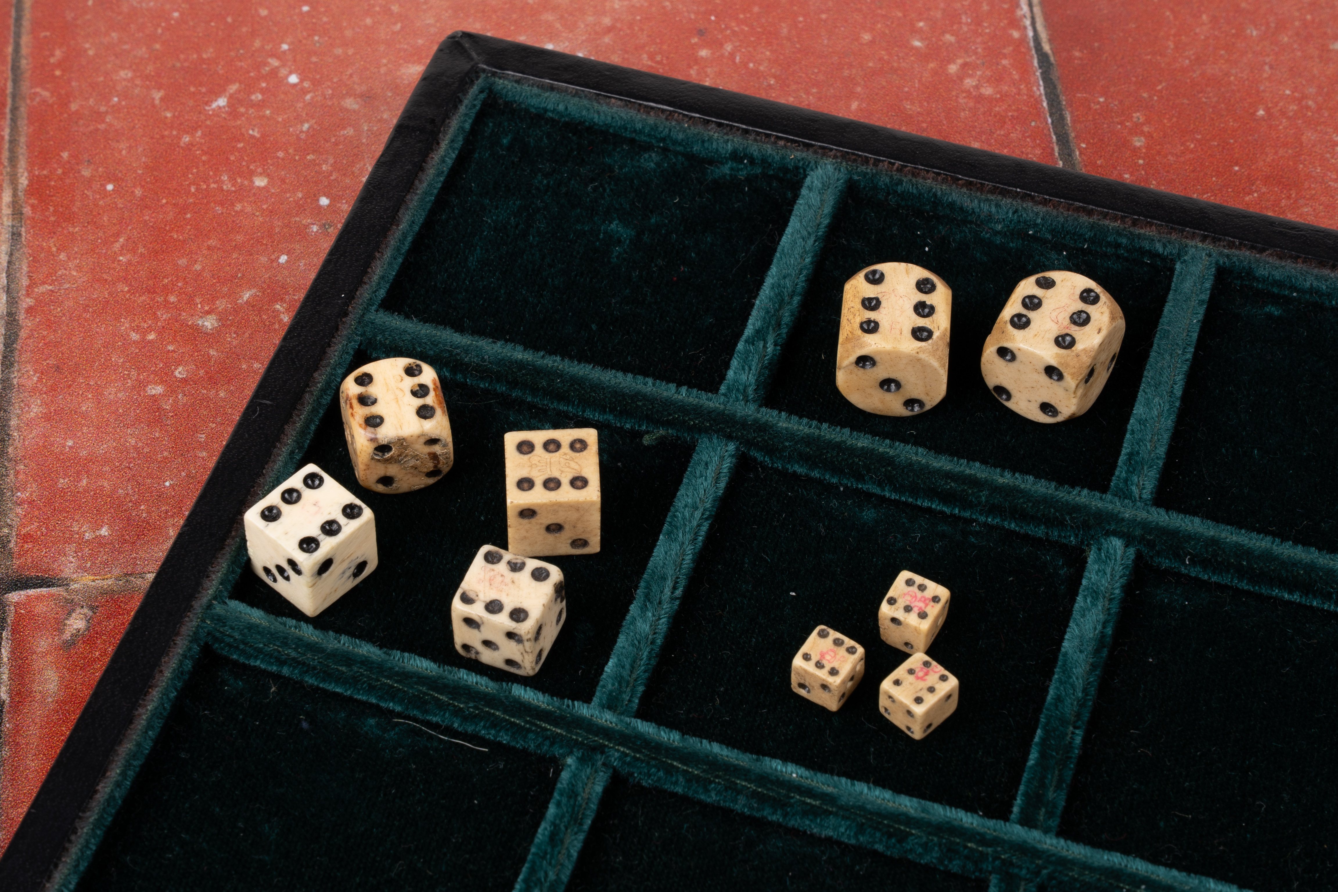 GB. Dice Duty. c1750-1838. A selection of dice with the six-spots punched with the Crown over GR or VR mark