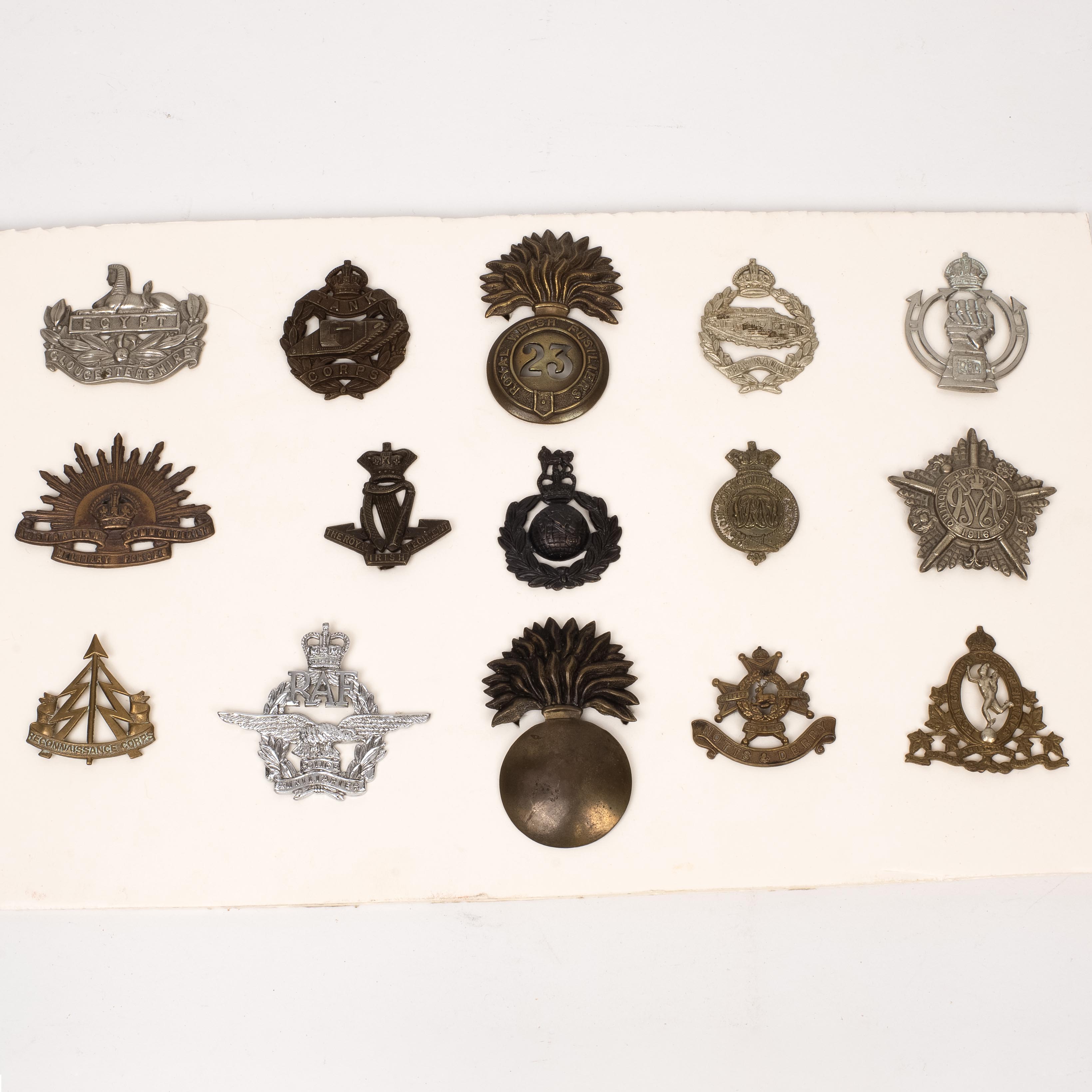 48 British Cap Badges, mounted on three cards