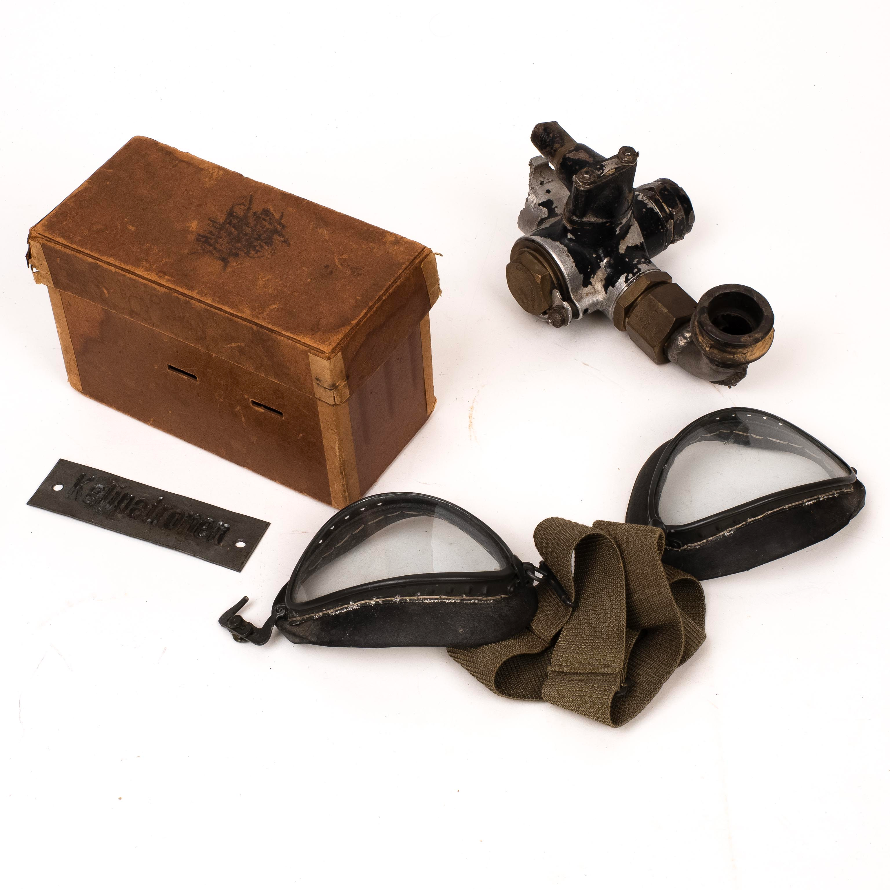 WWII Luftwaffe Flying Googles (damaged), in box of issue. Instrument plate from U-boat. Part of WWII German aircraft 