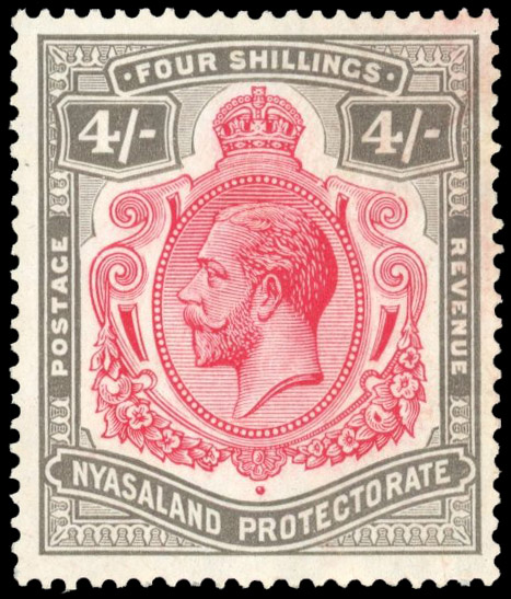 Nyasaland SG 95a 1913-21 4/- break in scroll mint
