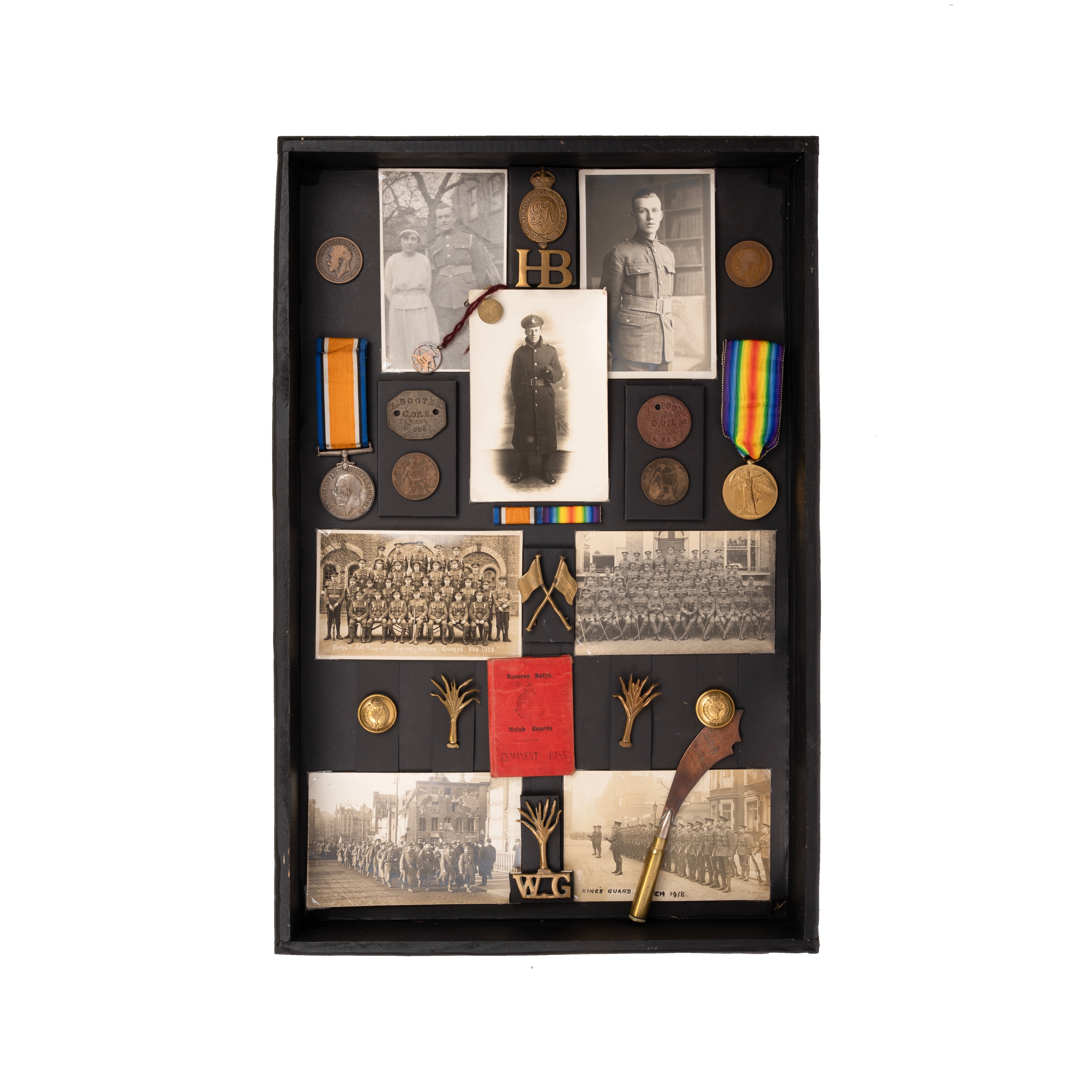 Medals and badges from Welsh Guards housed in display box