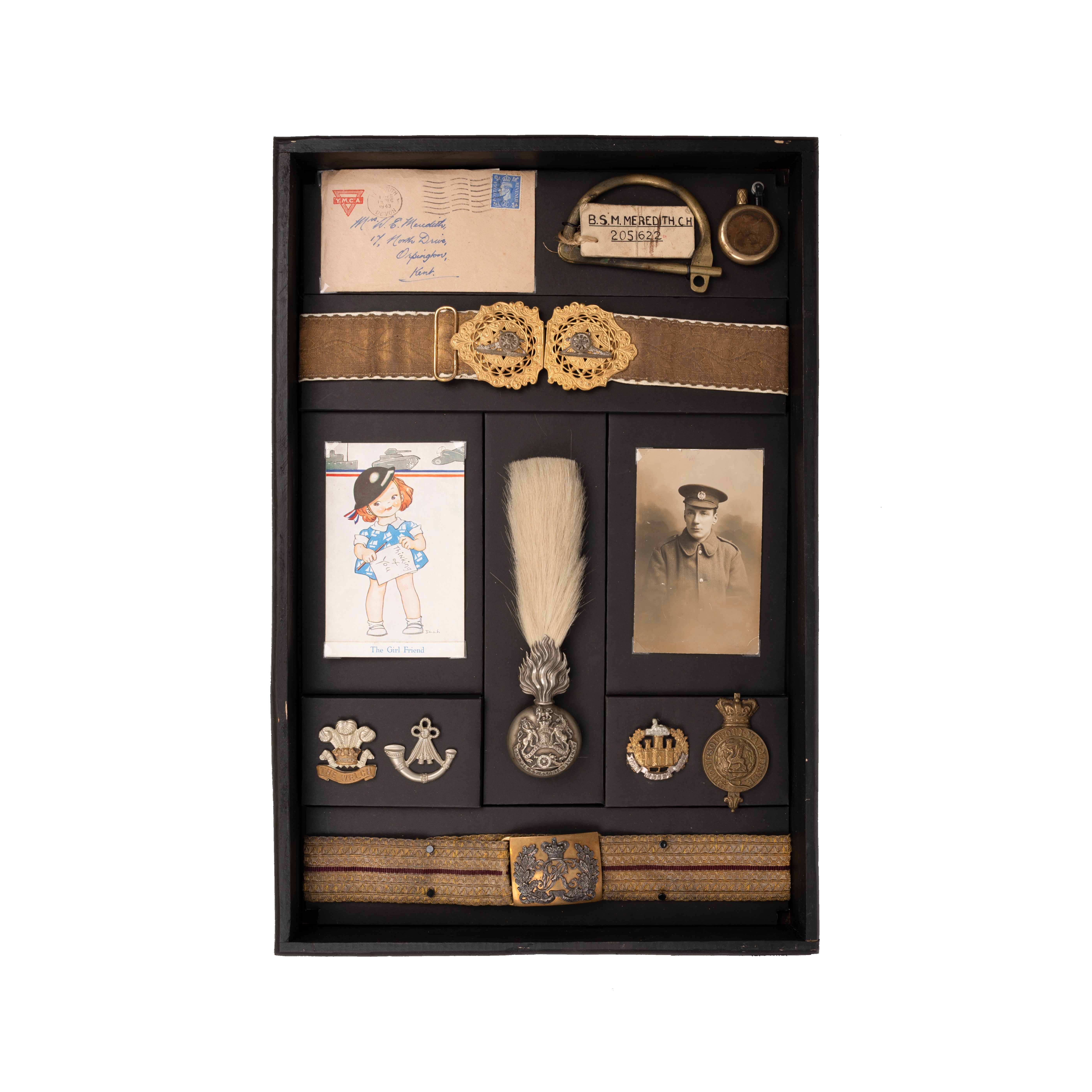 Belts, Cap Badges of the Royal Artillery Welch Essex Regiment, housed in display box