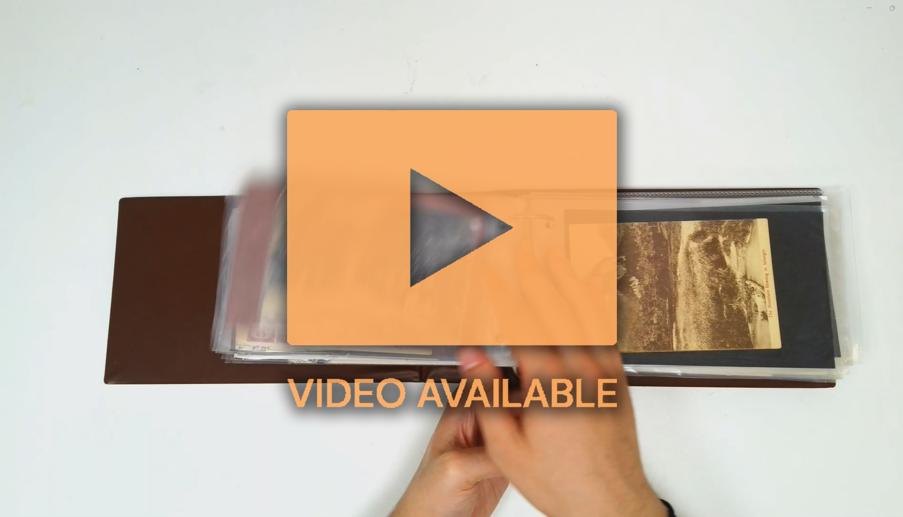 Malaya postcards in album