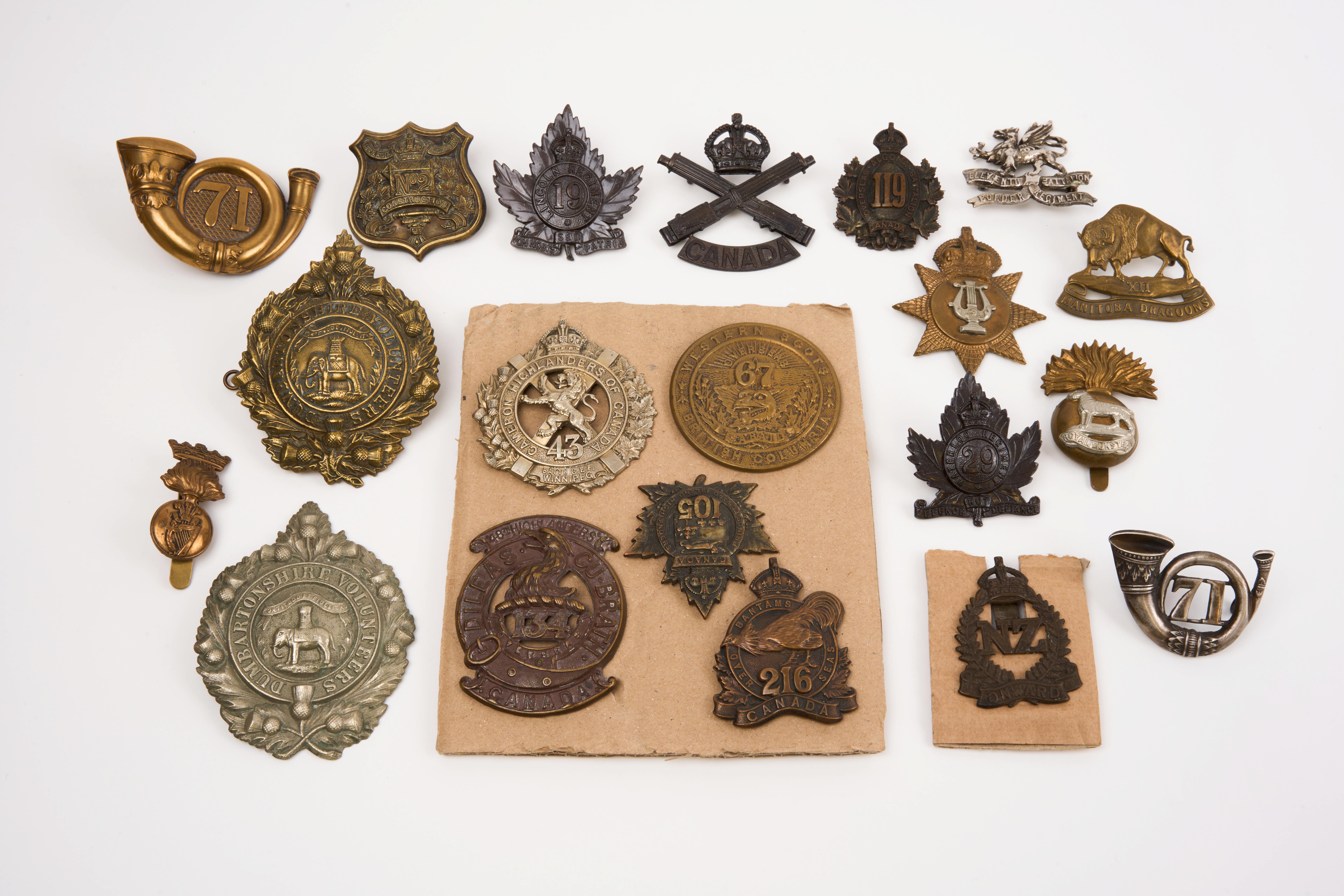 20 British and Commonwealth cap badges, loose in envelope