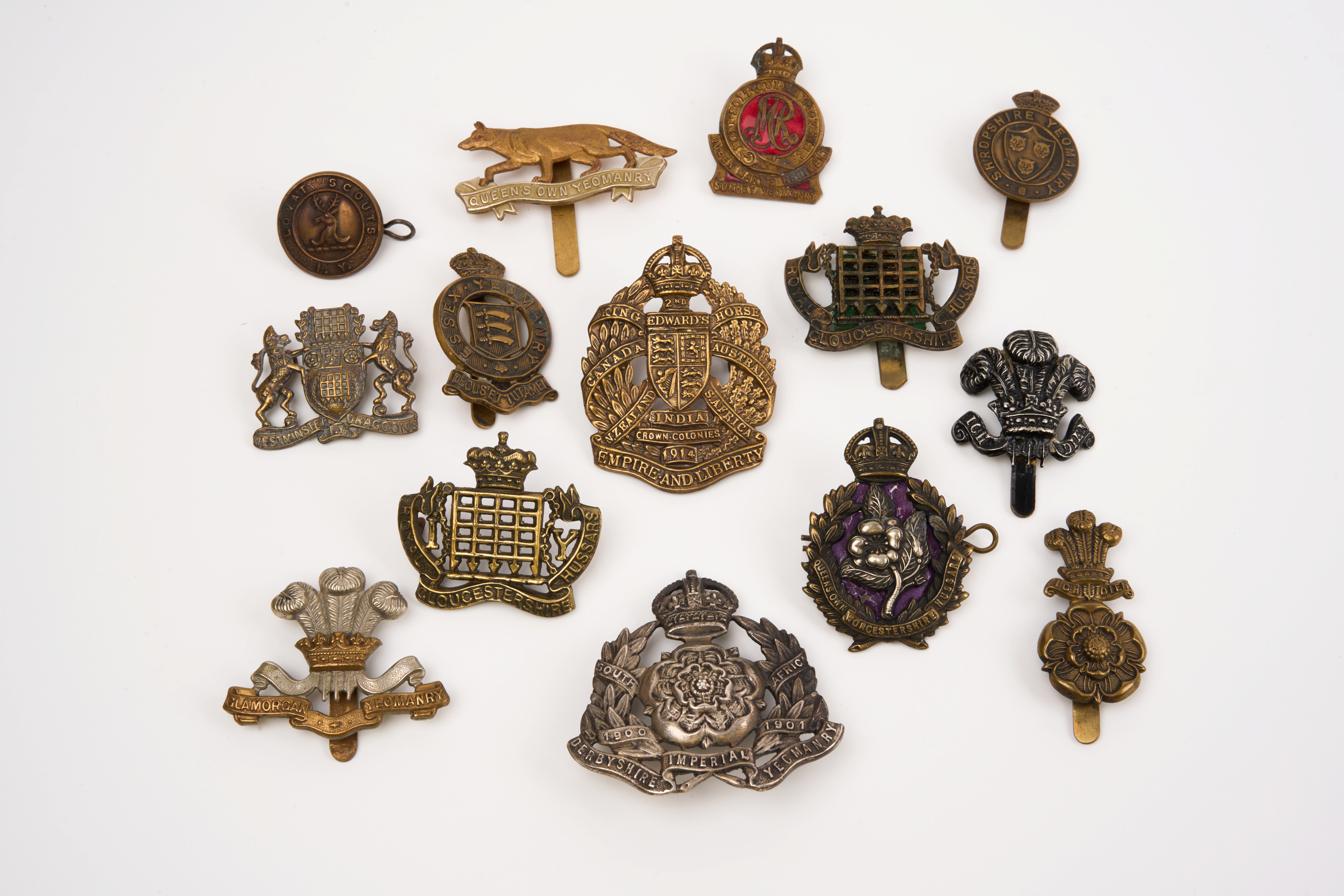 14 British cap badges, loose in envelope