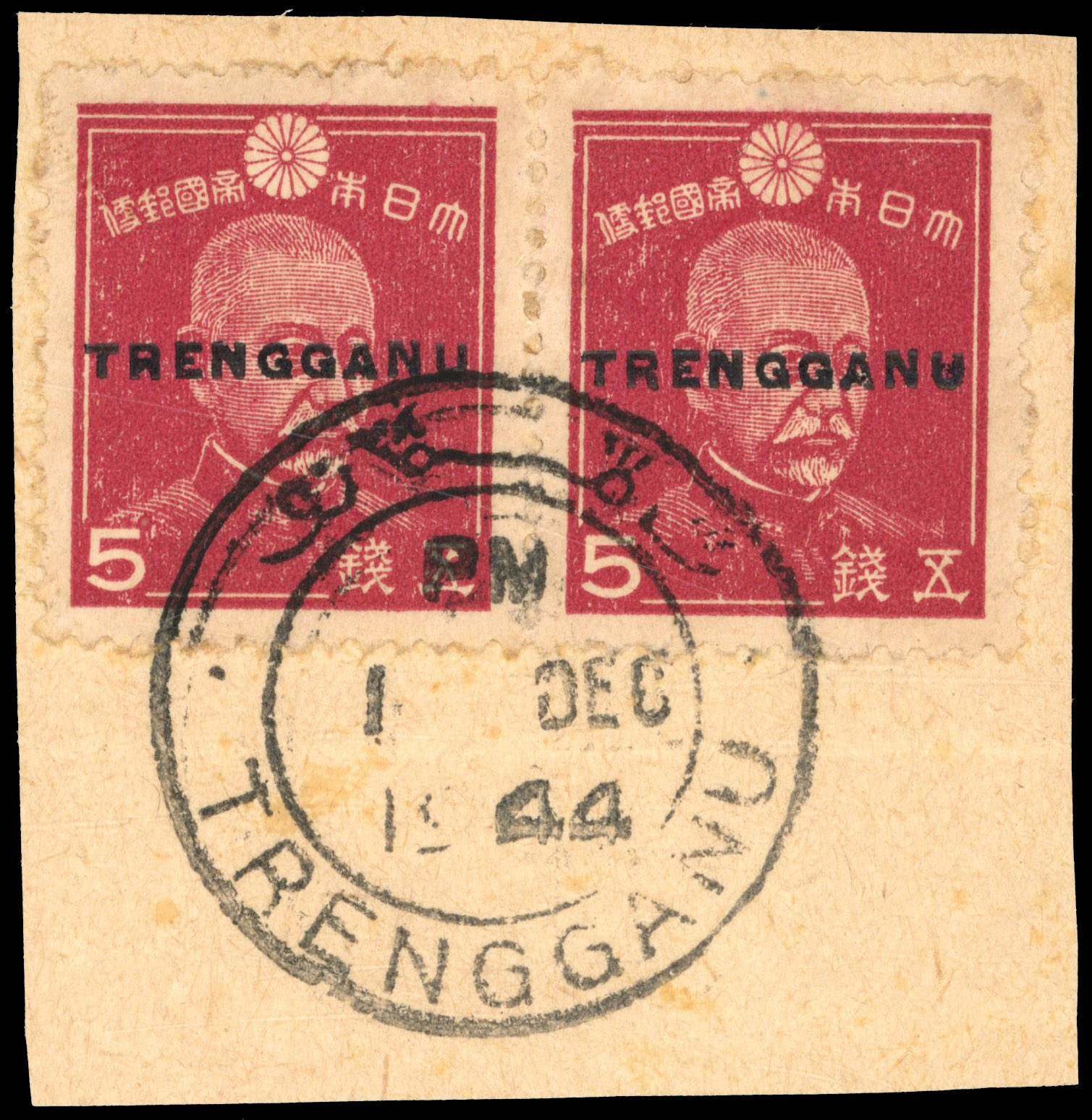 Thai Occupation of Trengganu: 1944 SG TT32 used pair on piece Japan 5s claret cat £2,000