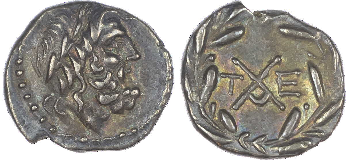 Achaia, Achaean League, Tegea (c. 88-30 BC) AR Hemidrachm, 2.28g. Laureate head of Zeus facing right. Rev. Monogram flanked