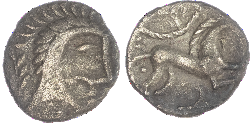 Iceni (c. 20 BC-AD 10) AR Unit, ‘Norfolk God Moustache’ type, 0.94g. Stylised and moustached head facing right, oval eye,
