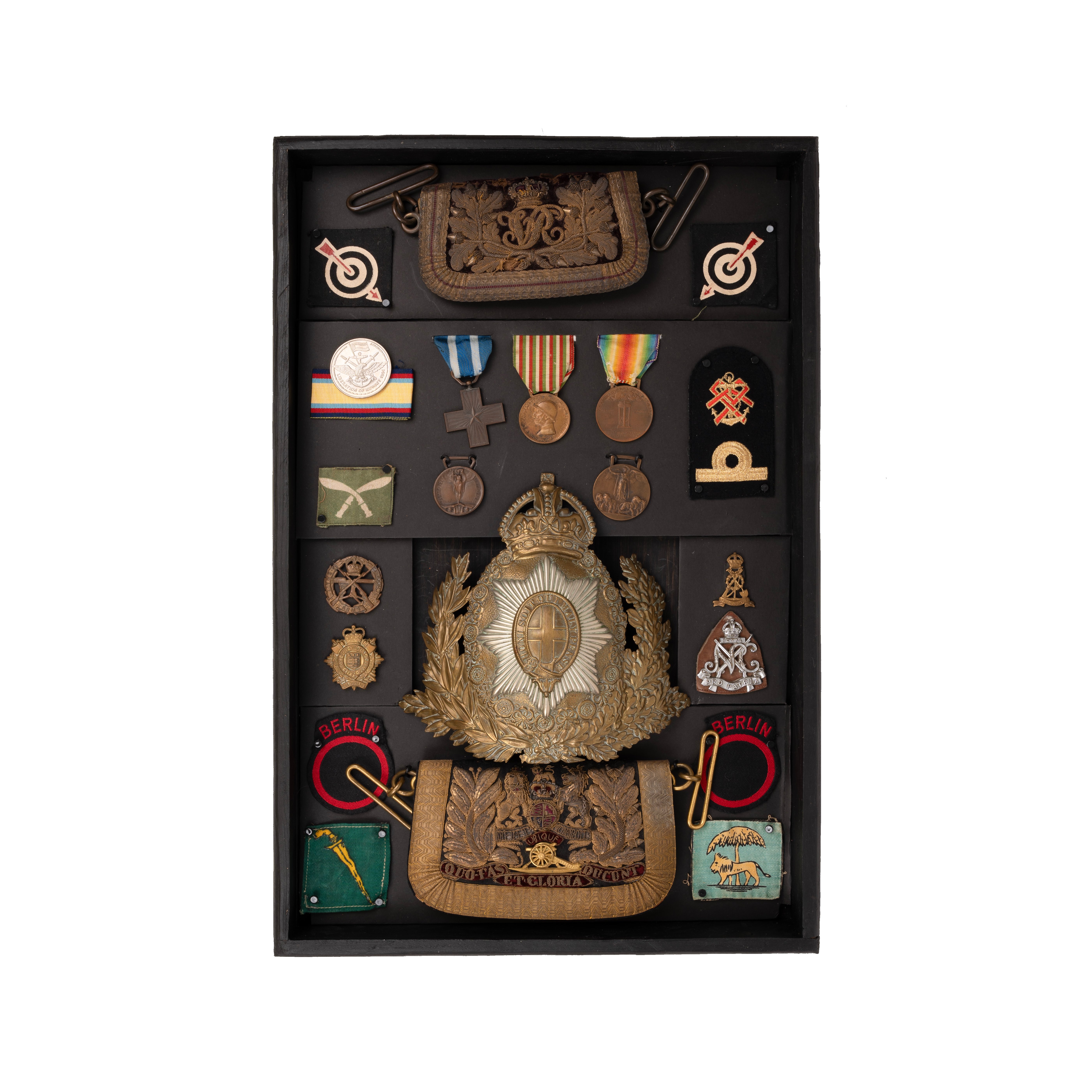 Belt pouches, helmet plate, medals and badges, housed in display box