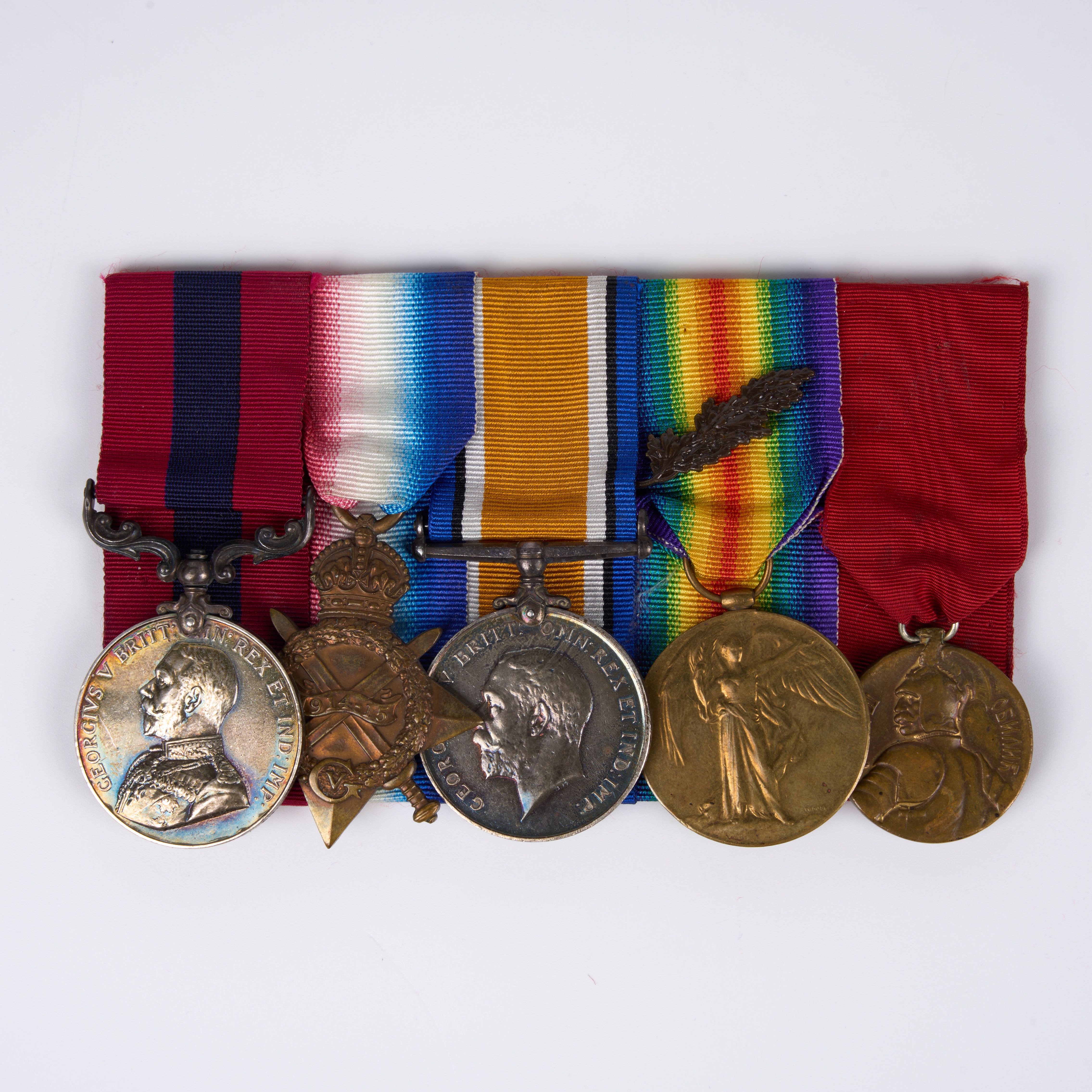 † The Salonika DCM and Obilich Medal who was wounded in Action in 1917