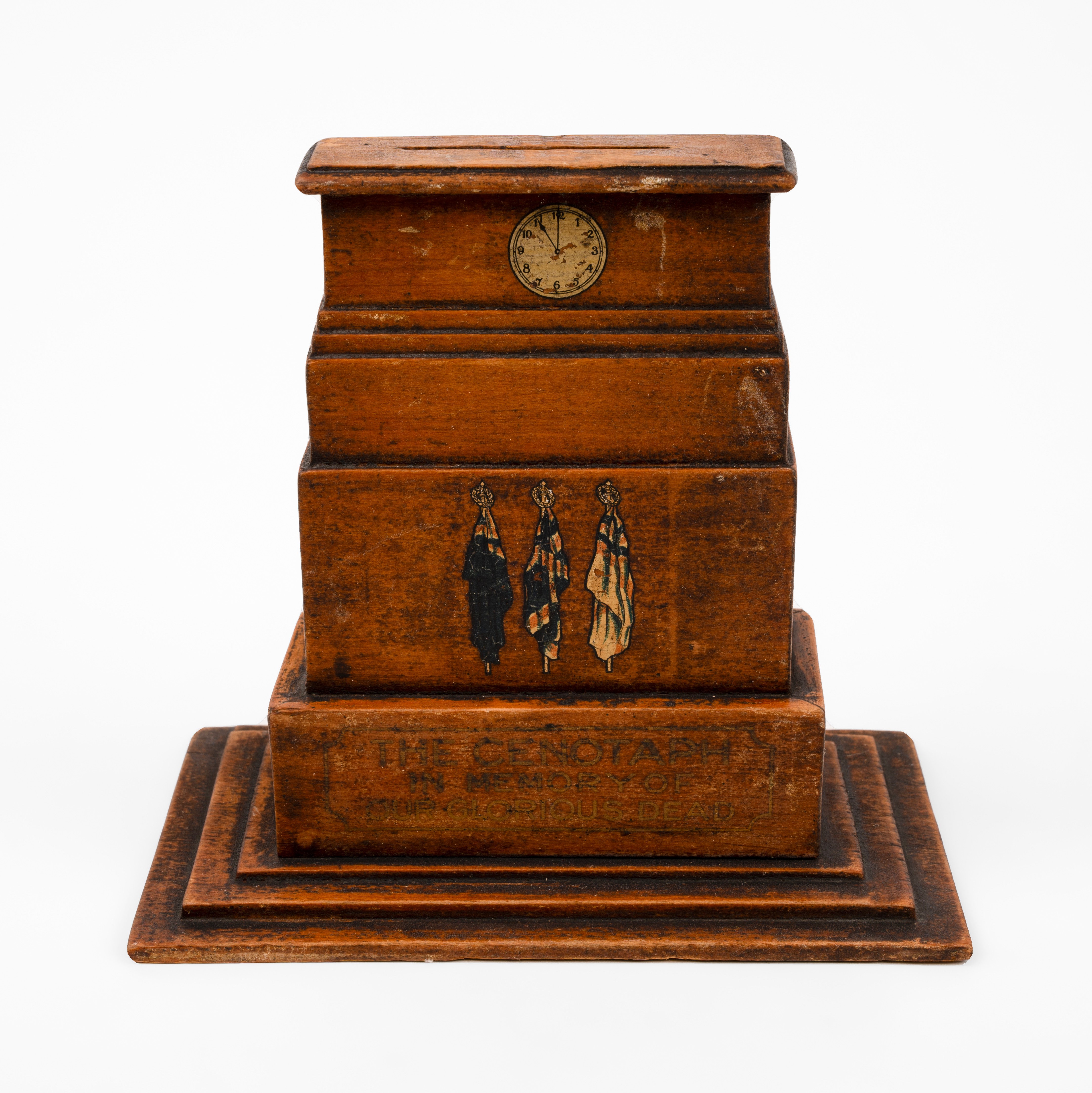 Wooden money box in the form of the Cenotaph, WWII Victory card game pack of cards, 1943 RAF diary, WWII pocket New Testament