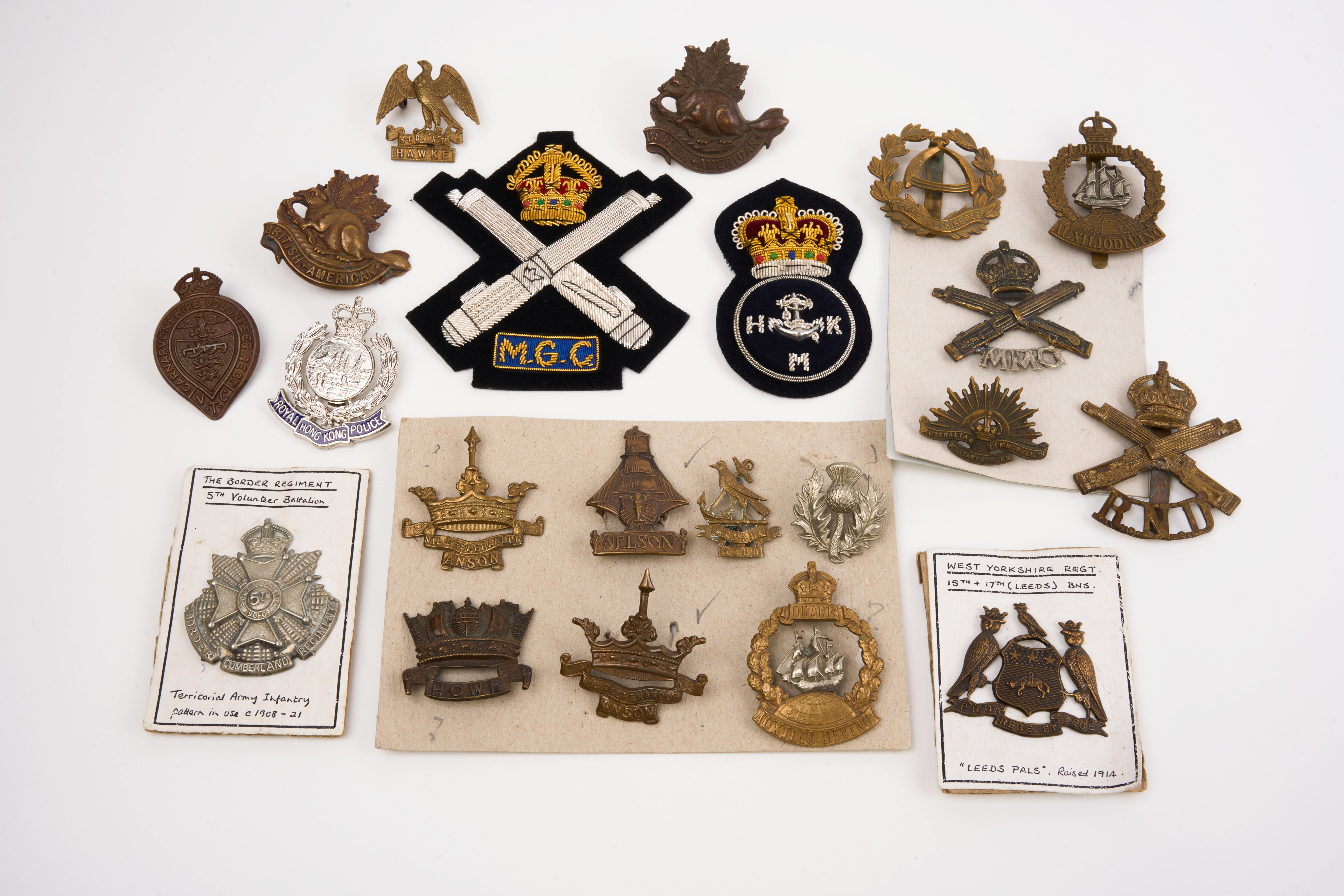 20 British and Commonwealth cap badges, loose in envelope