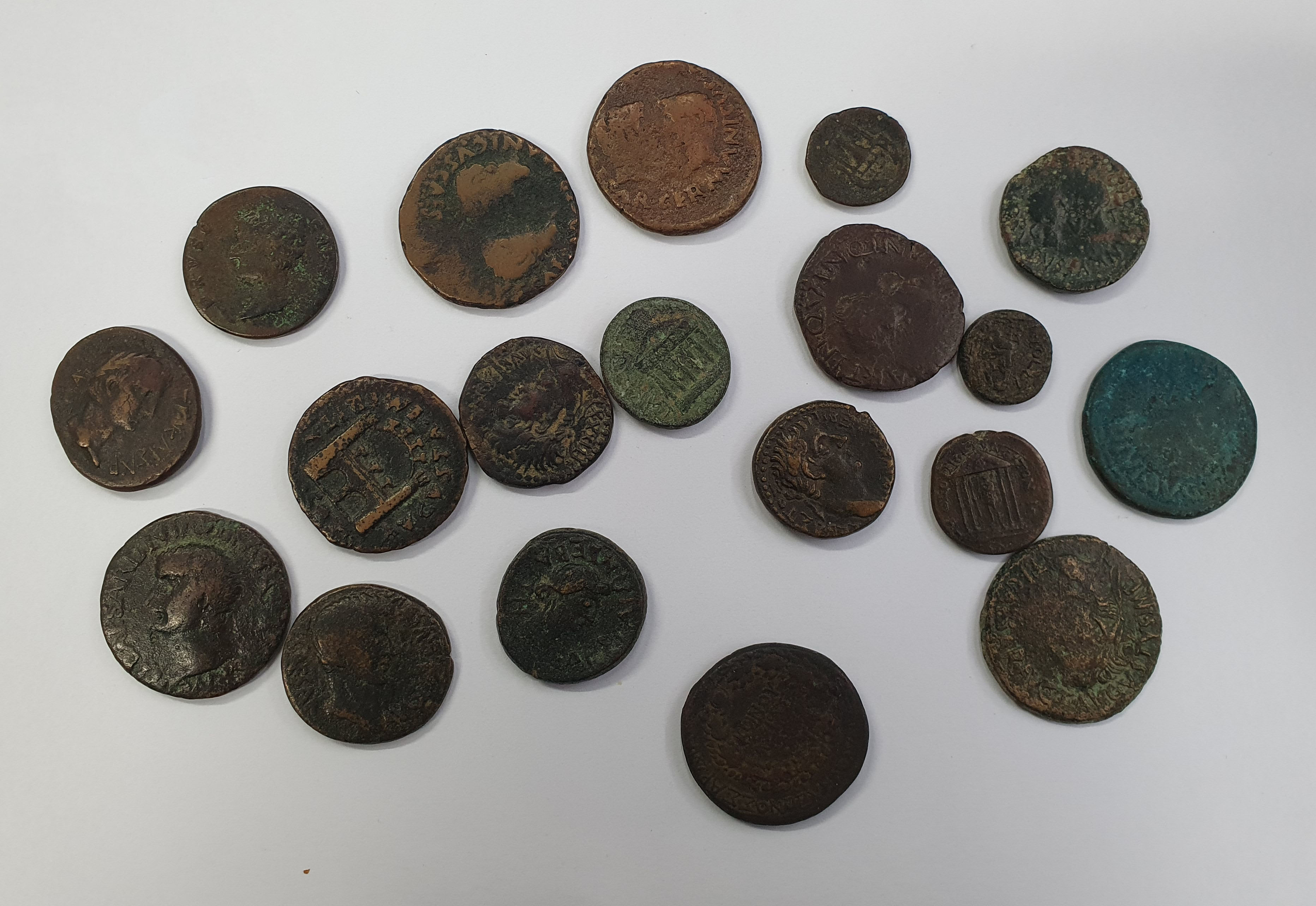 Group of 19 Tiberius provincial AEs. Varying mints and types.