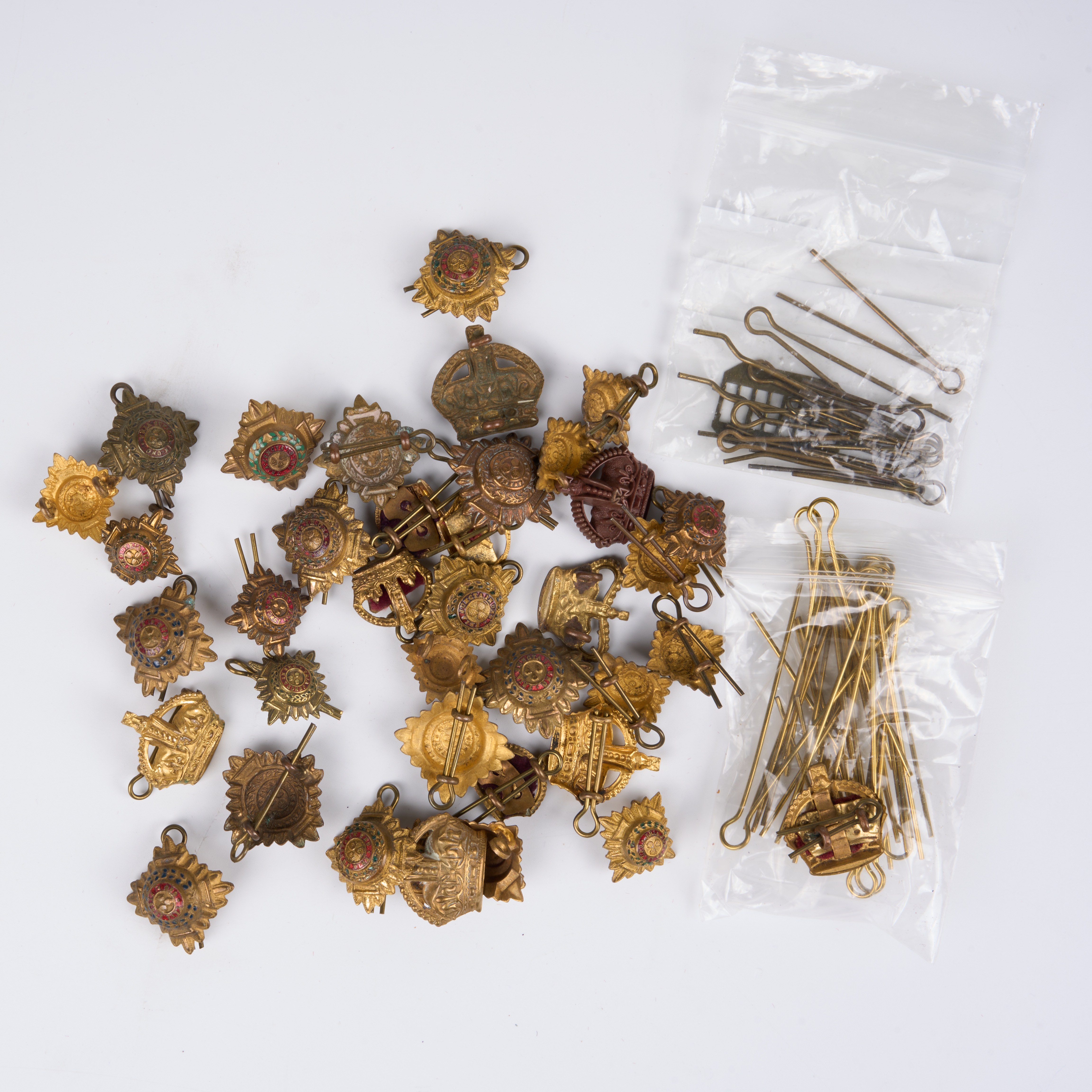 70 mixed rank pips and cap badge pins, loose in envelope